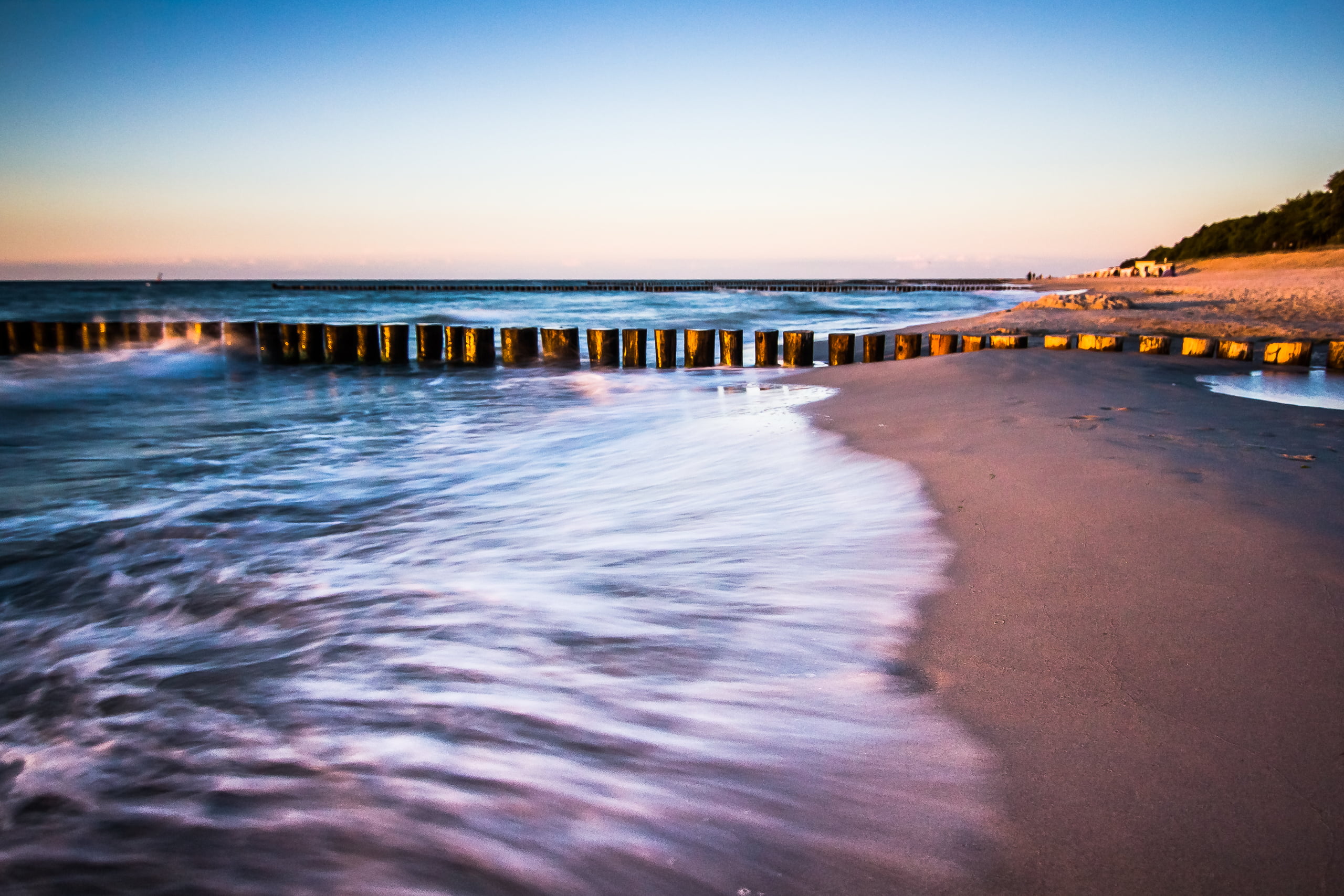 blue body of water during daytime baltic sea ostsee strand 2k
