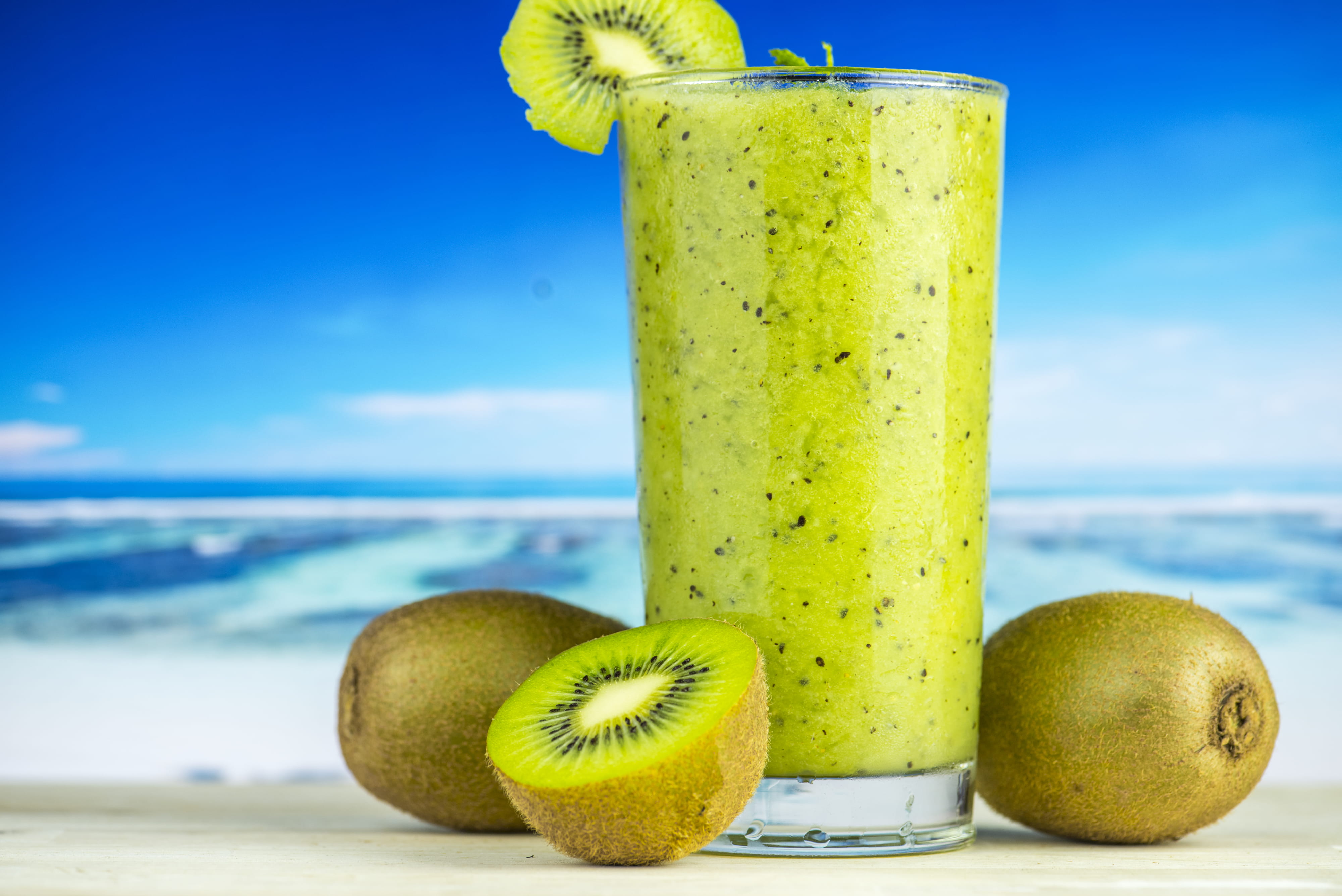 Kiwi Fruit Beside Drinking Glass Filled With Shake beach 2k 4k