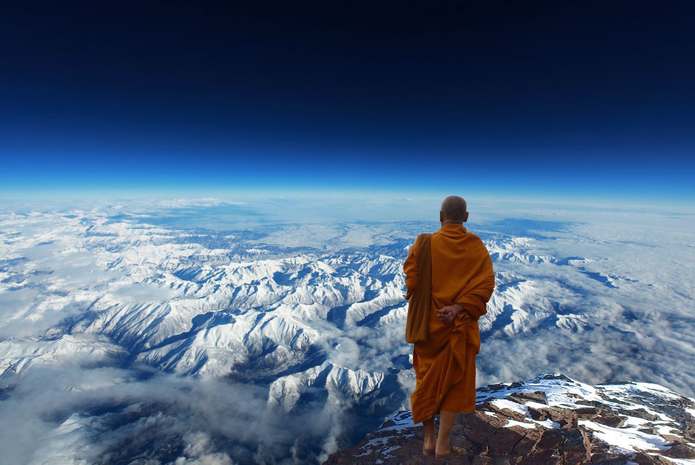 monk standing on top of summit mountain buddhist buddhism meditation 2k