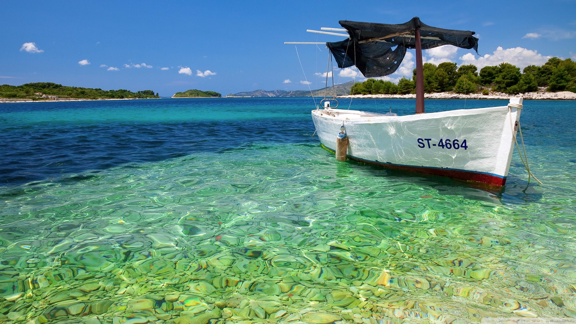 Small boat fishermen white st sea water beach 2k
