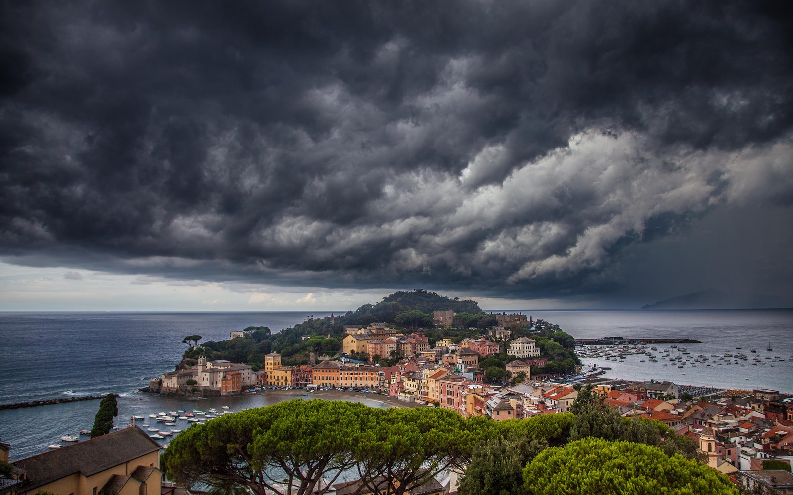 town city storm clouds horizon sea coast boat beach 2k