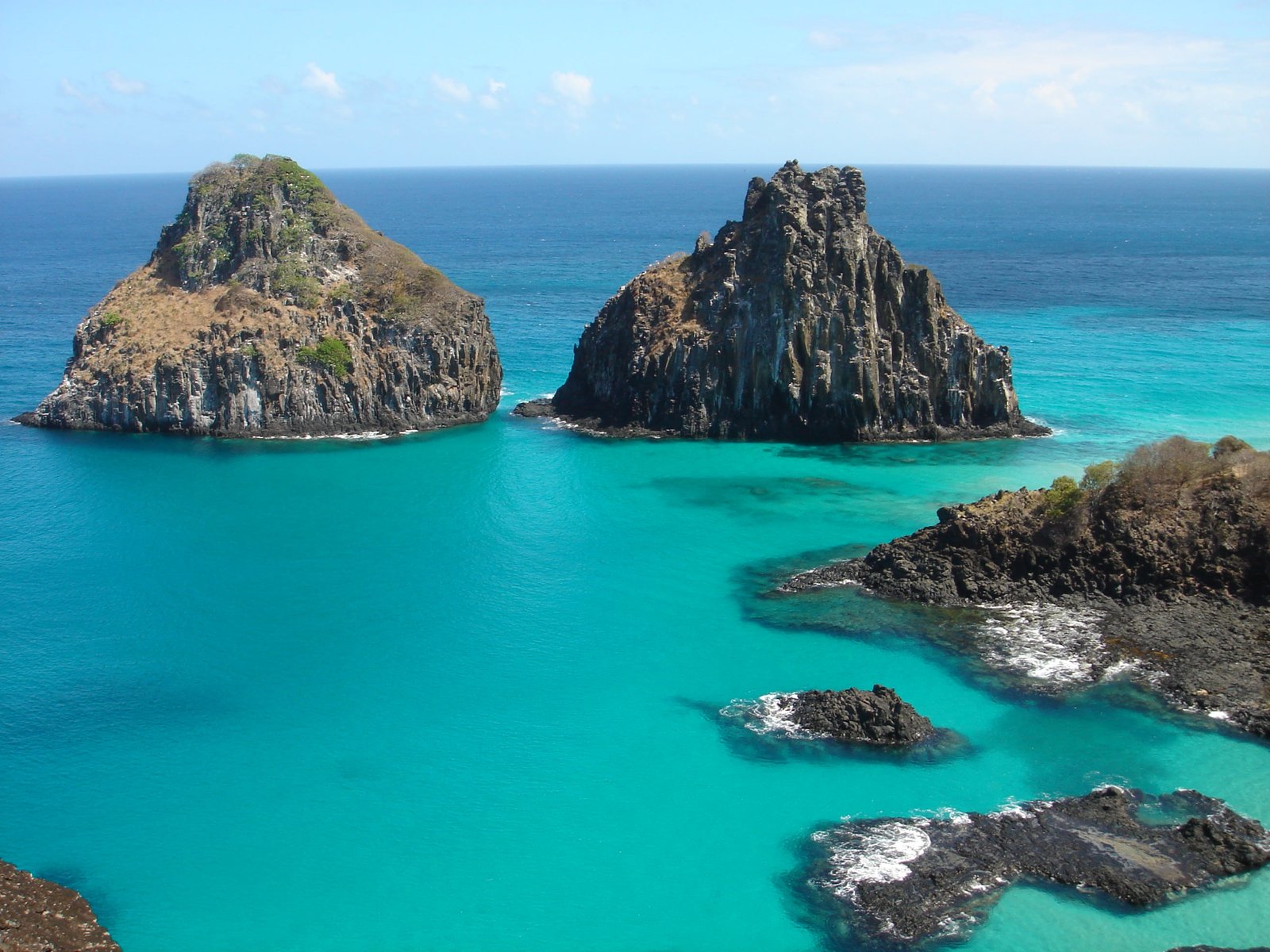 aerial photography of cliffs surrounded by body water fernando de noronha 2k