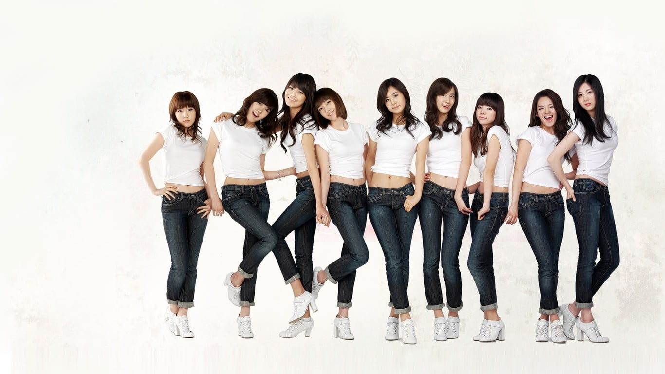 group of women wearing matching white shirts SNSD Girls Generation