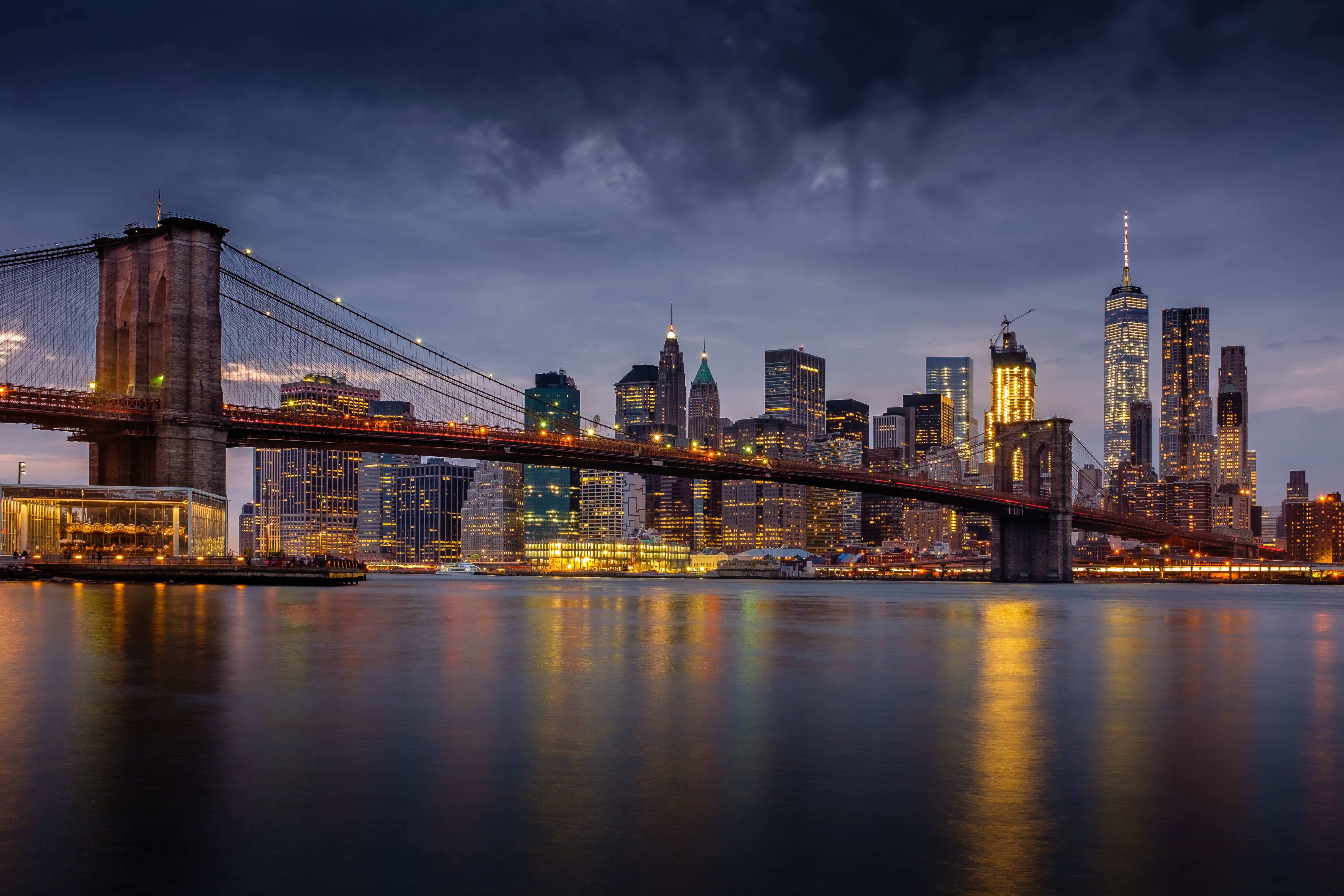 photography of black concrete bridge and city building during night time 2k 4k 5k
