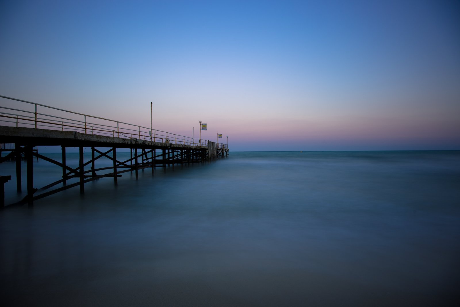 bridge surrounded by body of water under blue sky bulgaria 2k 4k 5k
