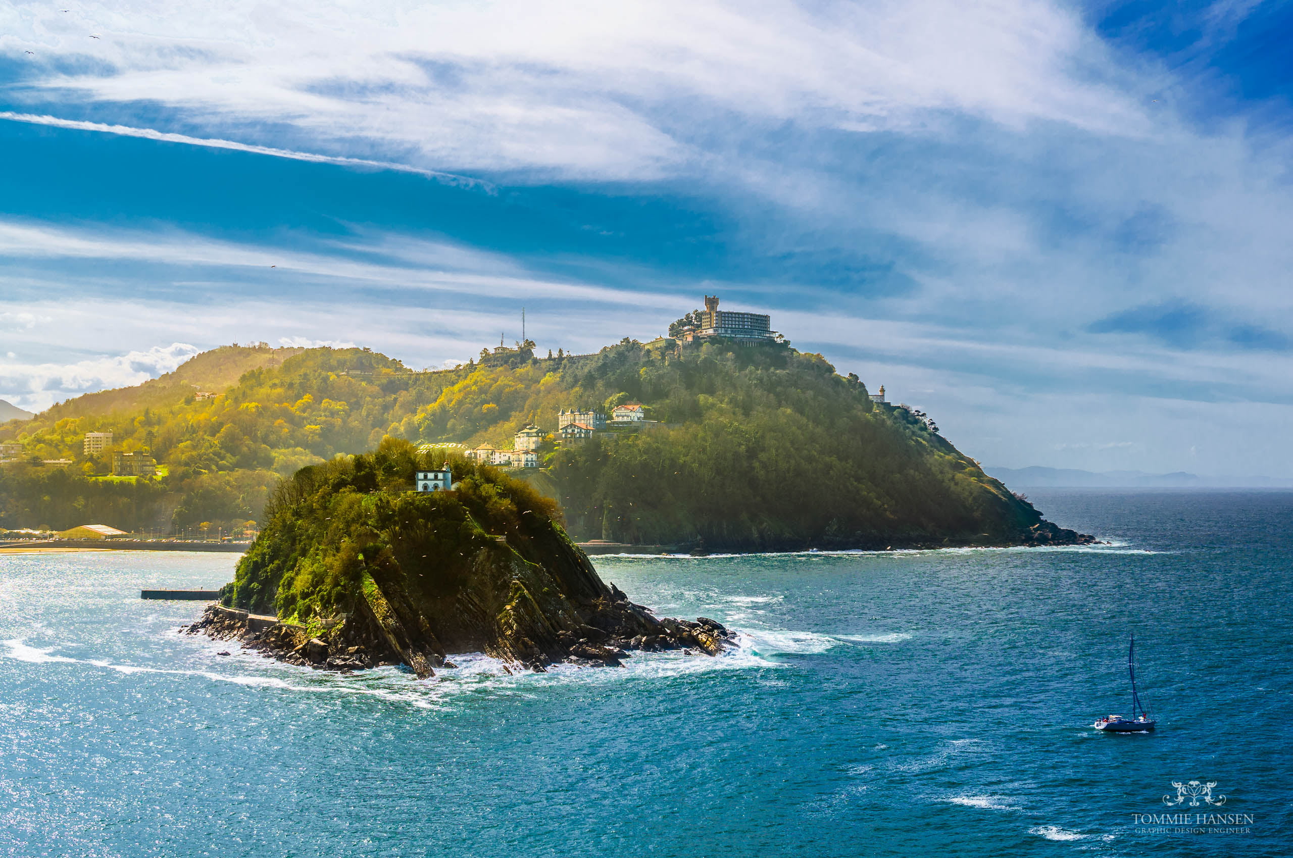 boat near island during daytime spain lonely house San Sebastian Spain 2k