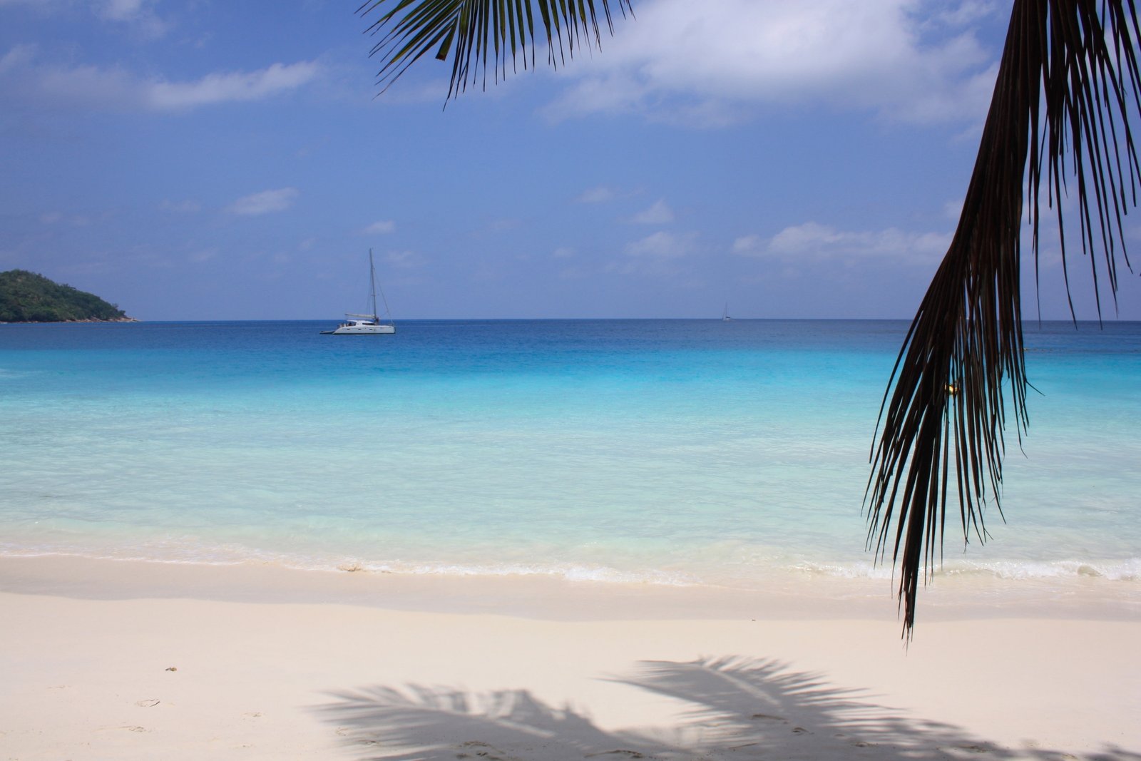 beach tropical sky sea boat water scenics nature beauty in 2k 4k