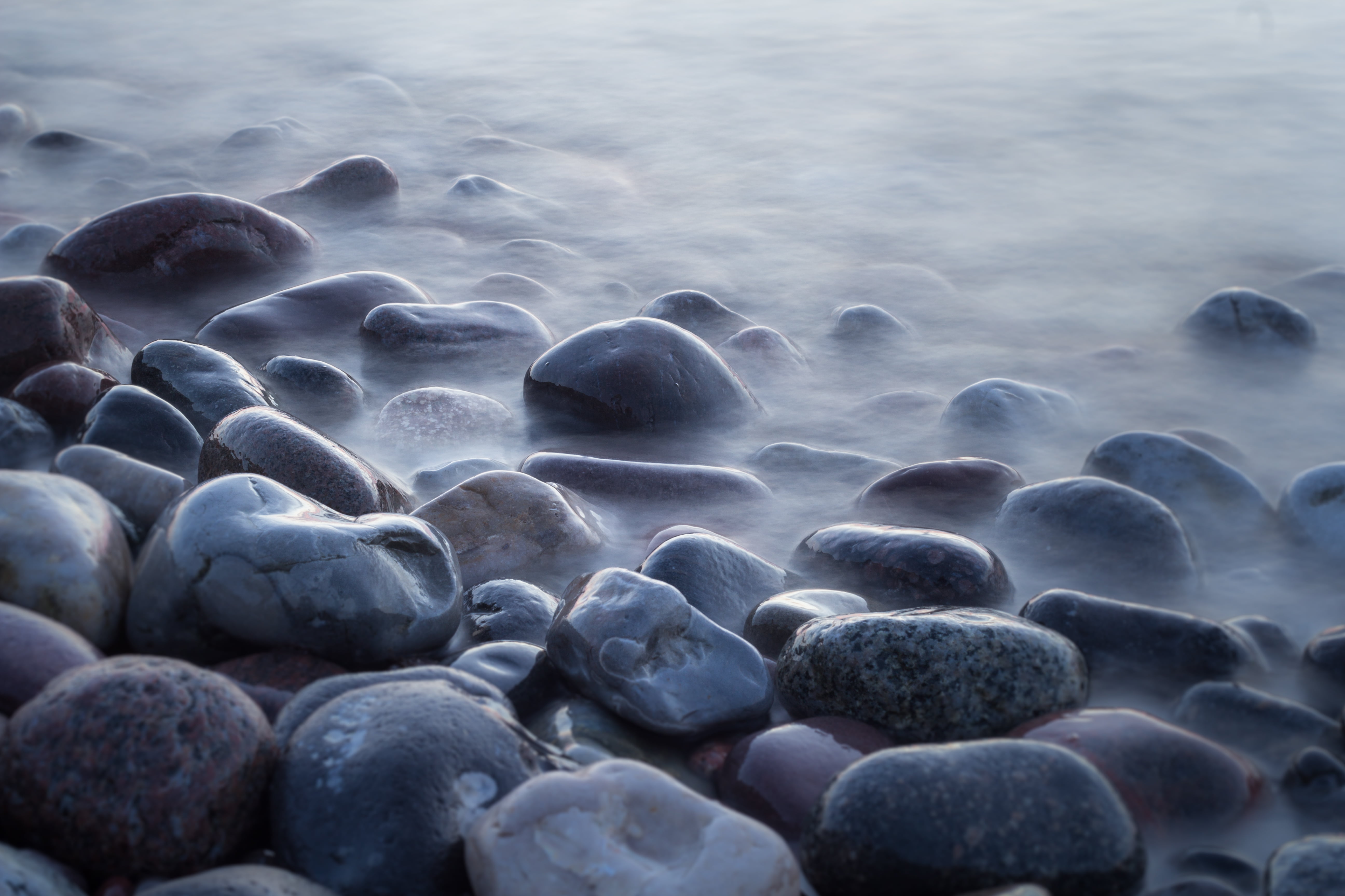 close up photo of pebbles Ostsee time exposure water rock Object 2k 4k 5k