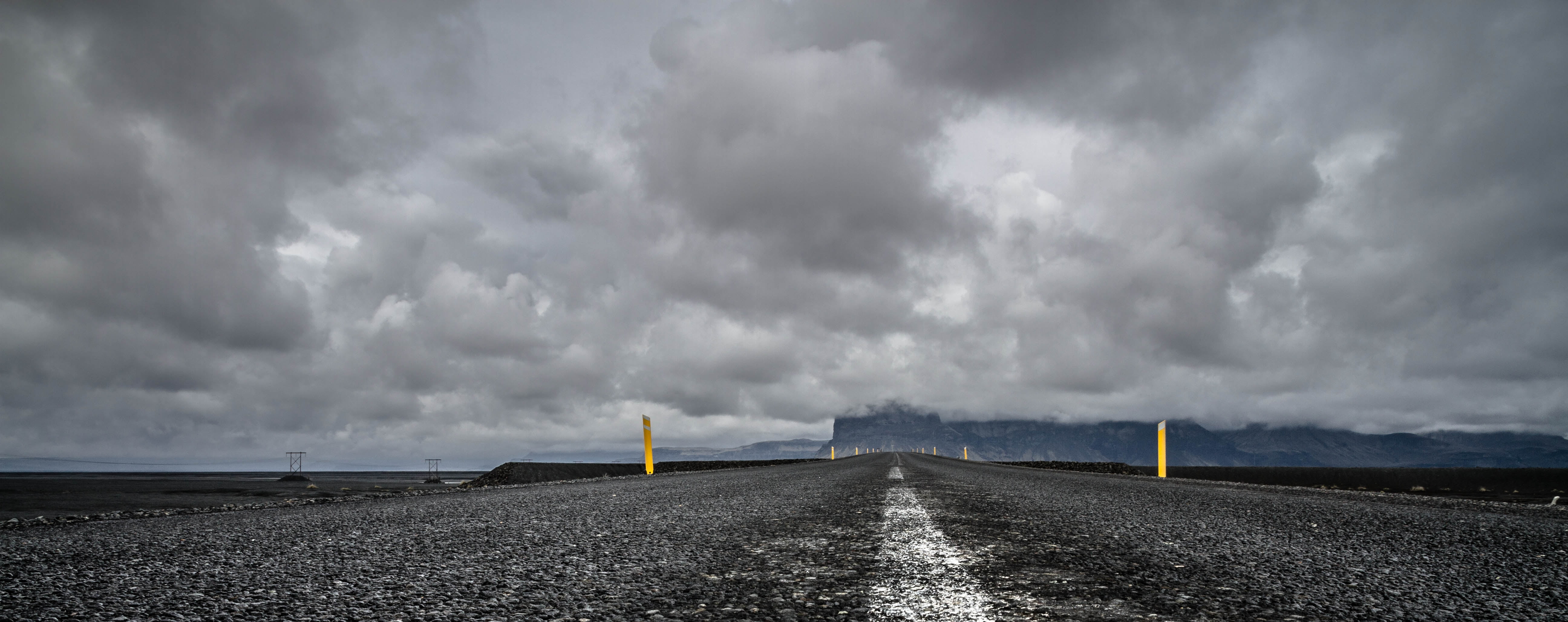 gray road under dark cloudy sky during daytime Iceland Background 2k 4k 5k