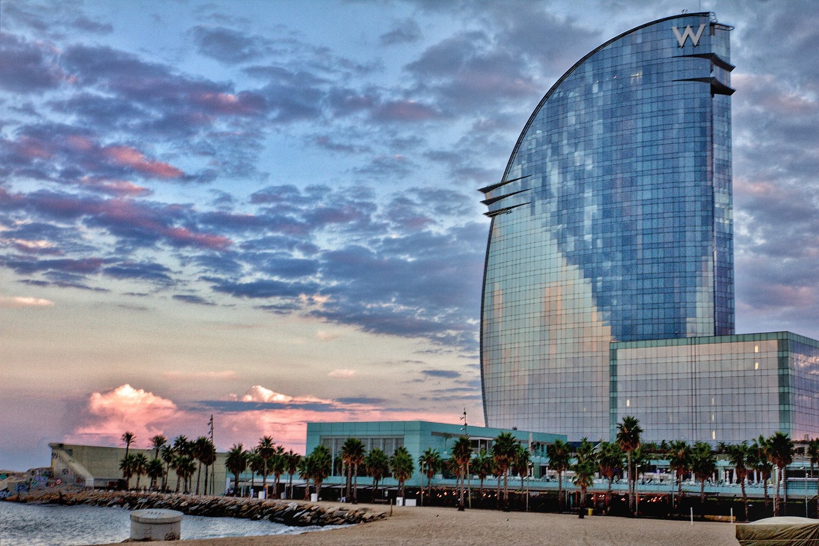 high rise building near beach w hotel barcelona barceloneta 2k