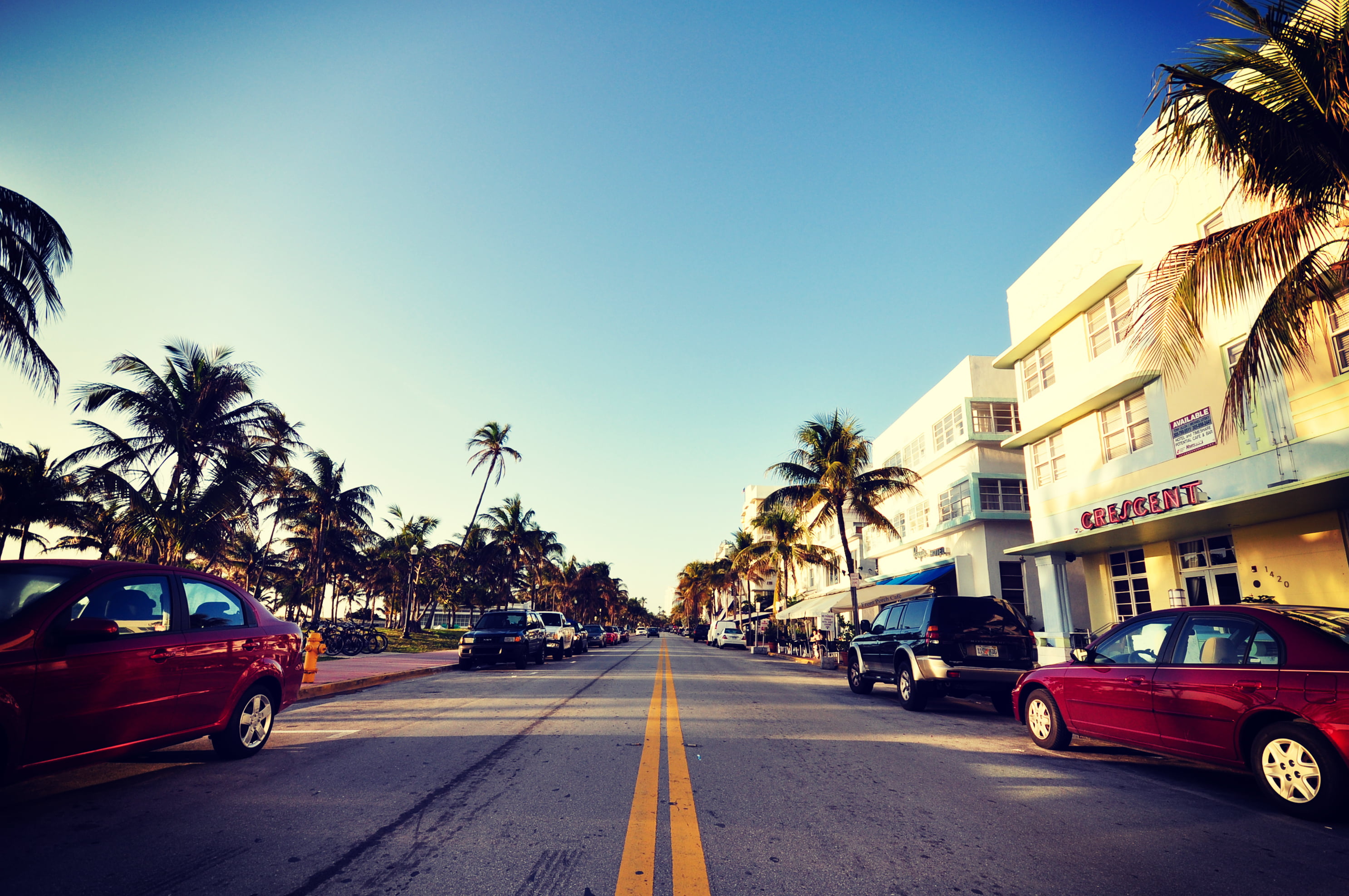 red sedan road auto the sky palm trees street Miami FL 2k