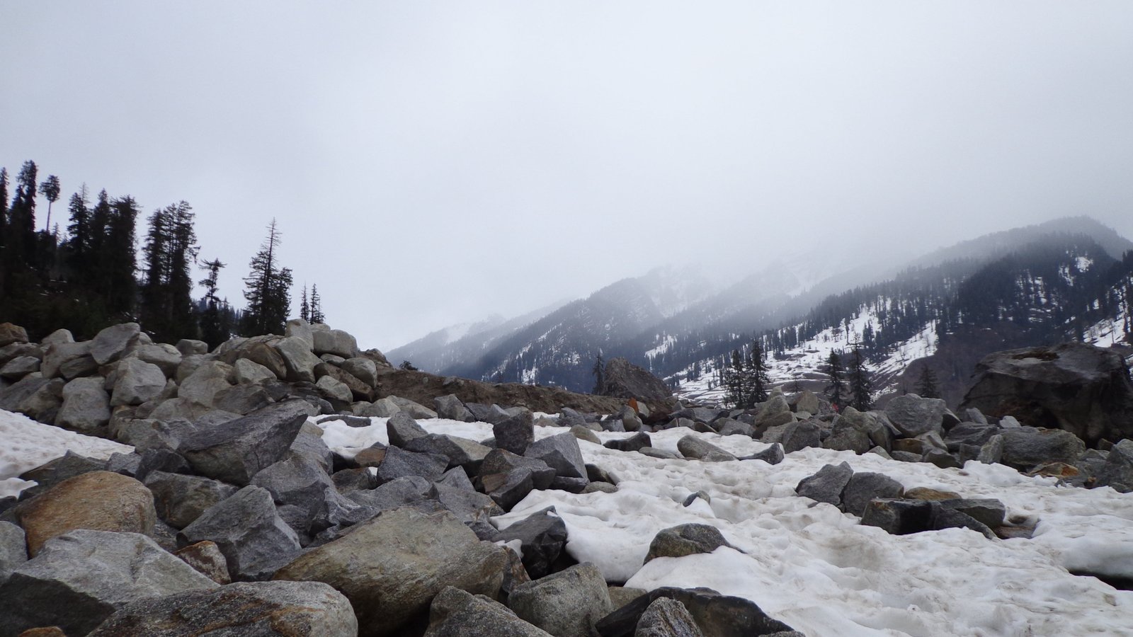 rocks surrounded with snow and fogs himalayas mountains winter 2k 4k 5k