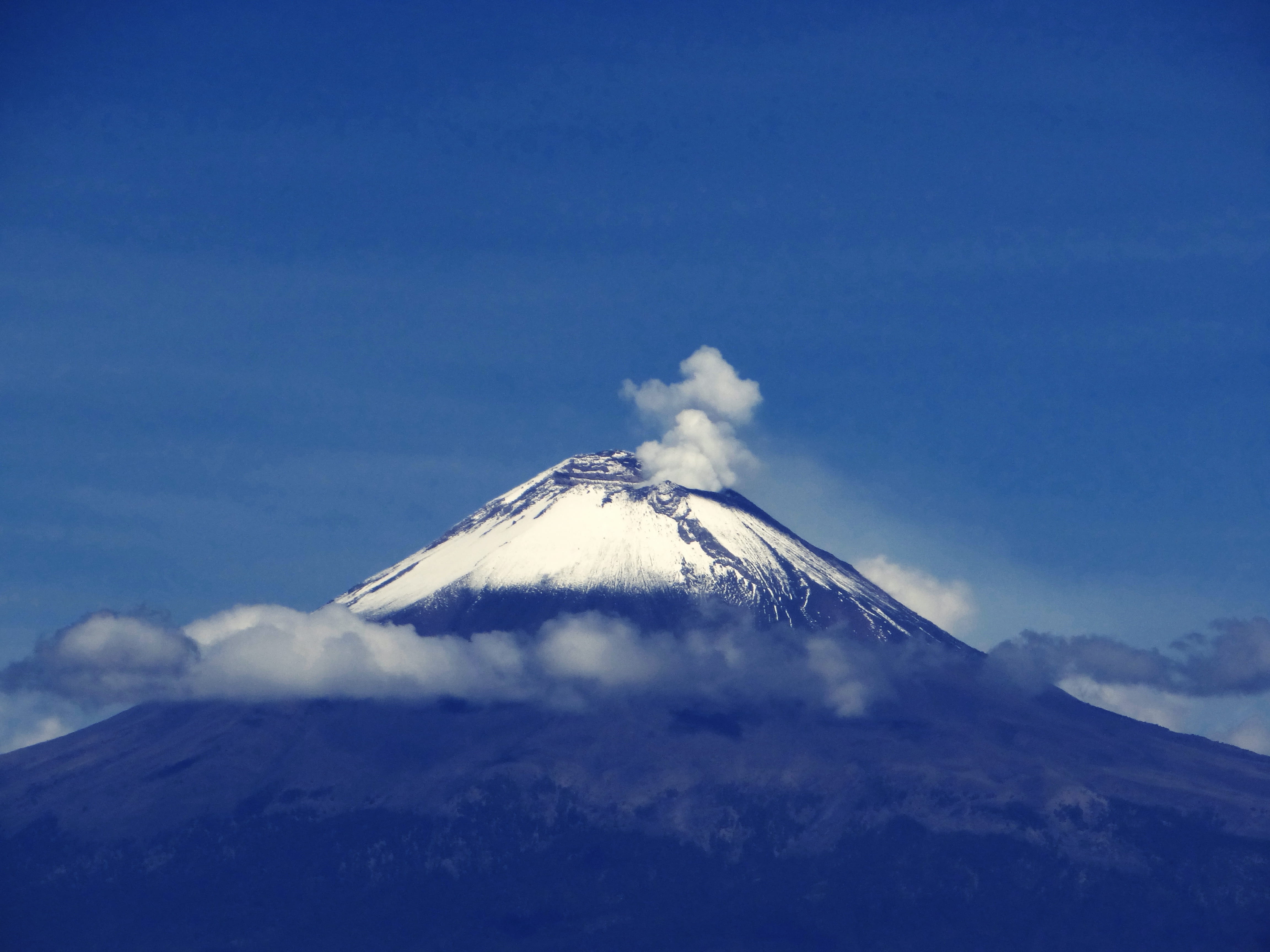 smokes on snow capped mountain during daytime outdoors nature 2k 4k 5k