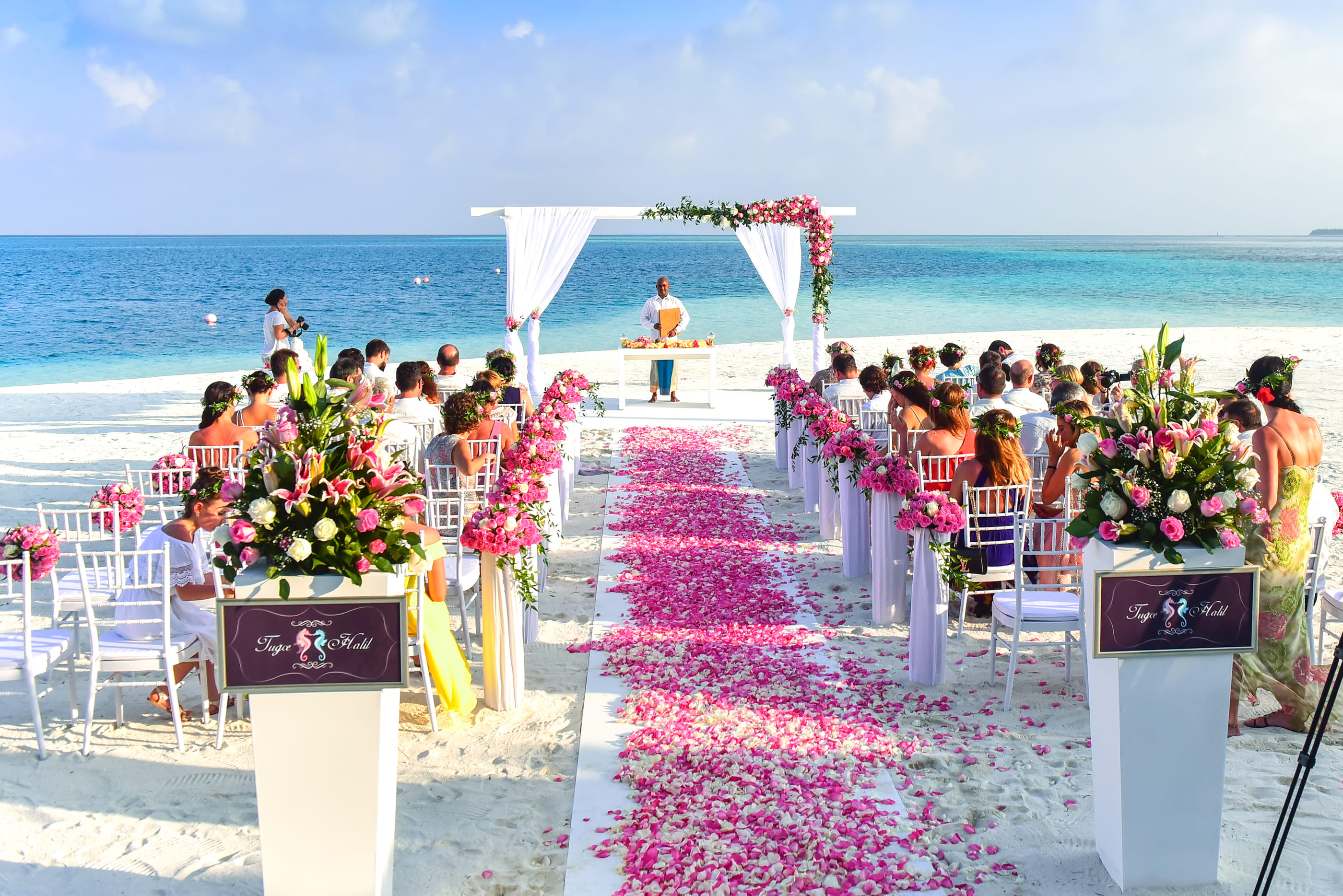Beach Wedding Ceremony during Daytime aisle celebration chairs 2k