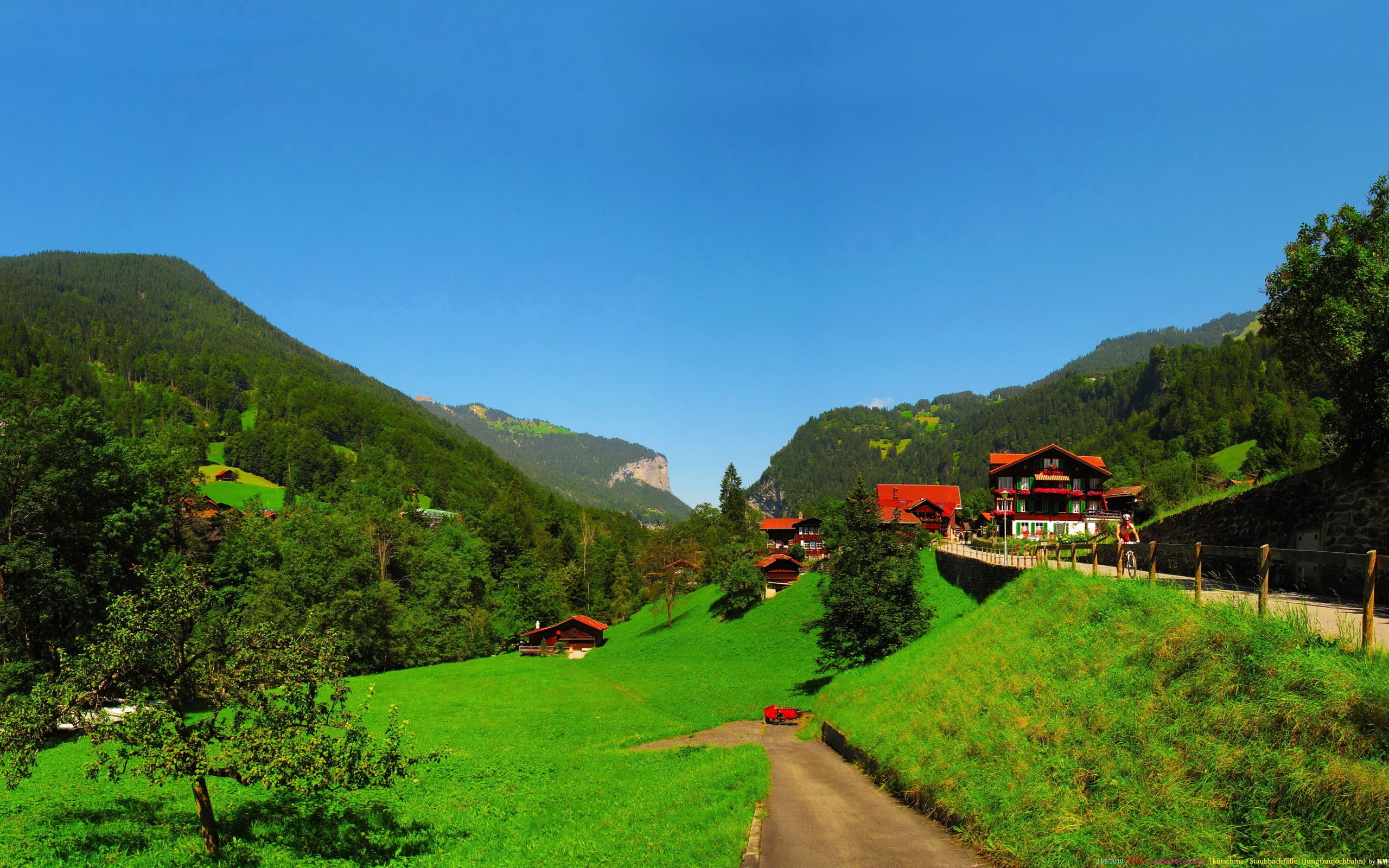 Bern Lauterbrunnen Switzerland countryside scenery houses trees mountains green grass and 2k