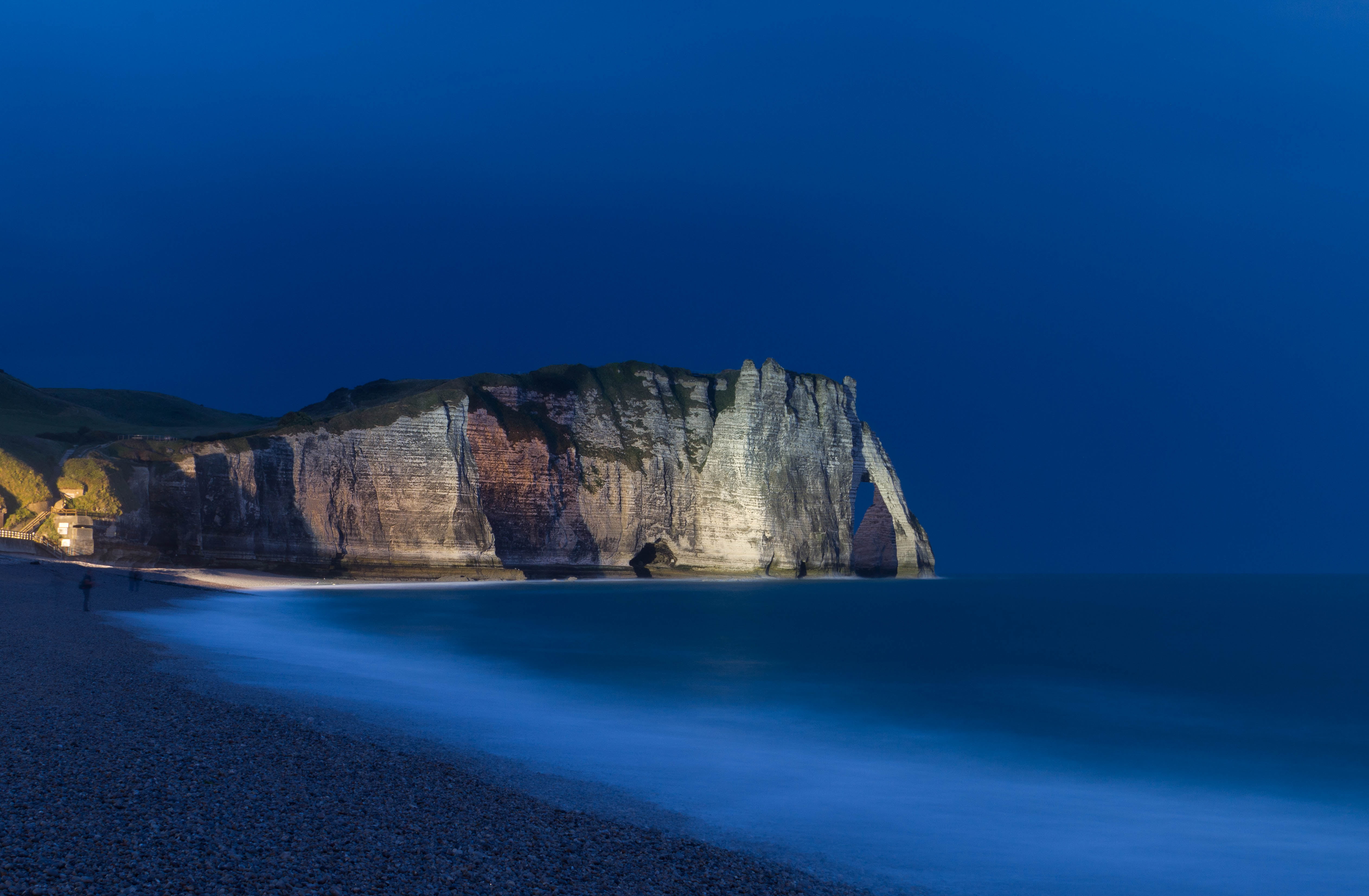 gray cliff near body of water during nighttime tretat cliffs 2k 4k 5k