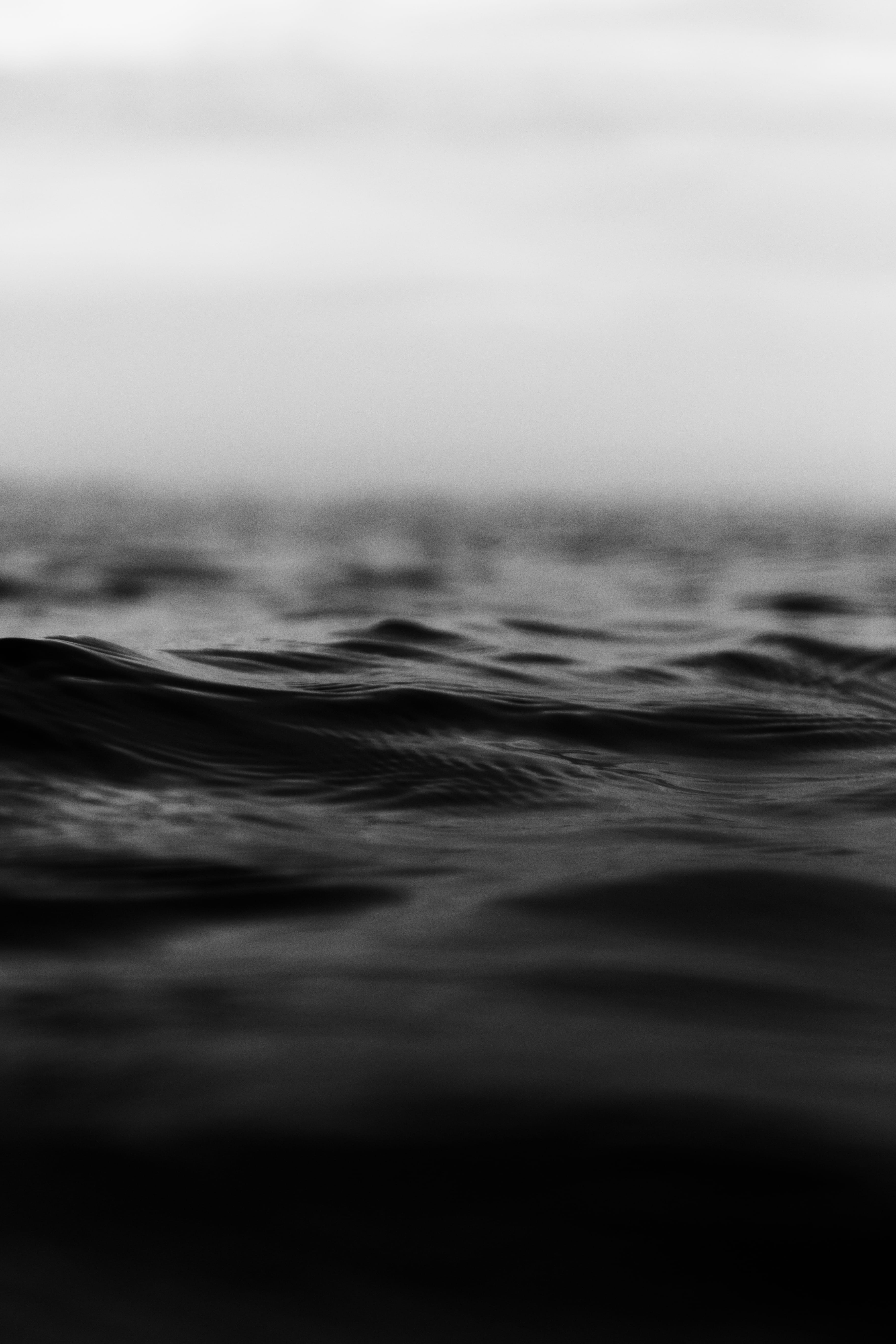 grayscale photo of water background ocean perspective surface 2k 4k
