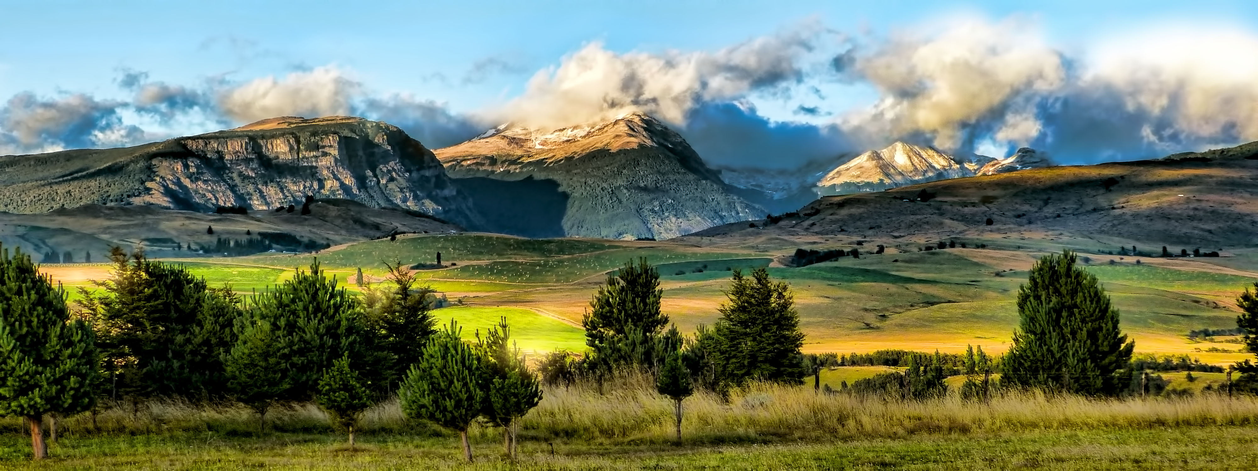 landscape photography of grass field de Coyhaique Explore 2k 4k