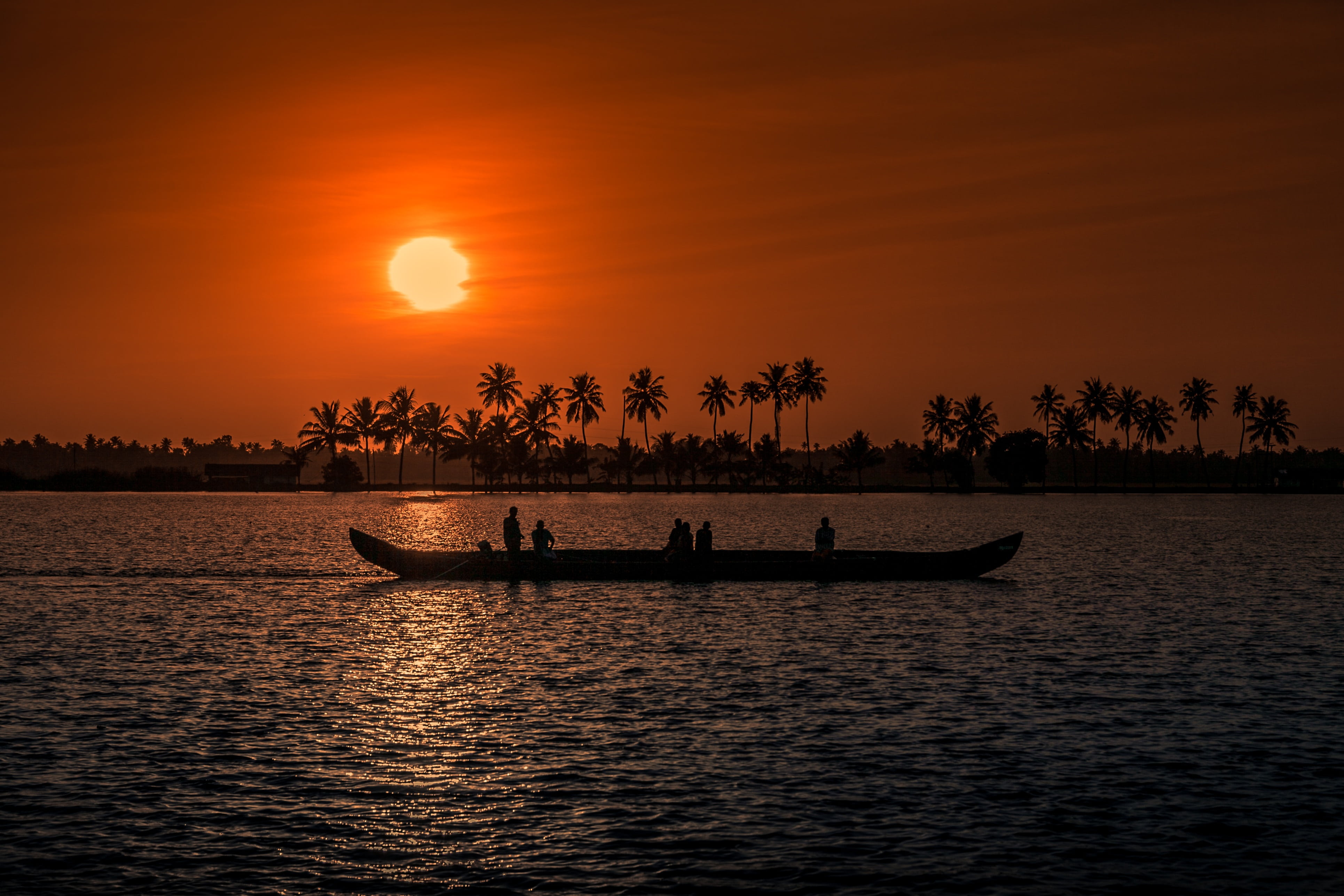 silhouette of canoe during sunset kerala aleppay boat fisherman 2k 4k