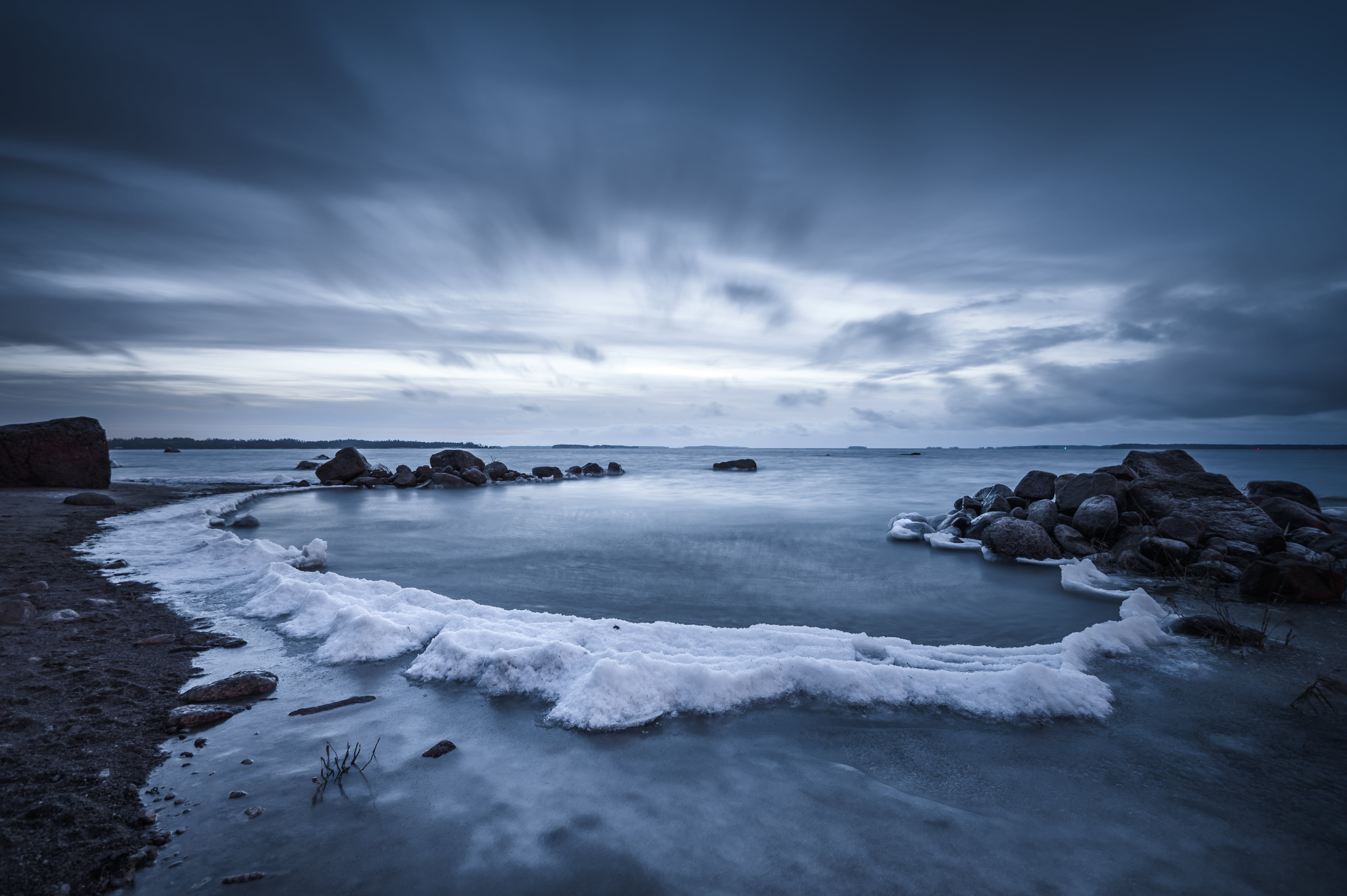 gray rock formation beside body of water Lagoon nikon d 2k 4k 5k