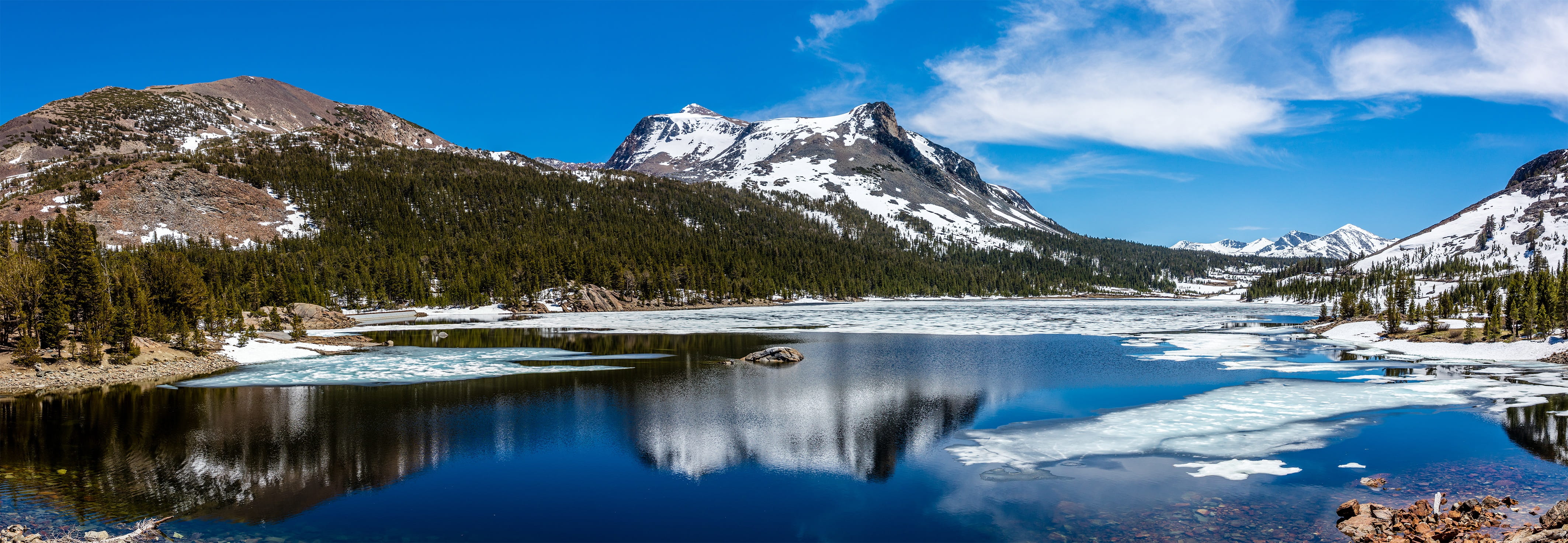 Mountains Near Body of Water Under Cloudy Sky daylight forest 2k 4k