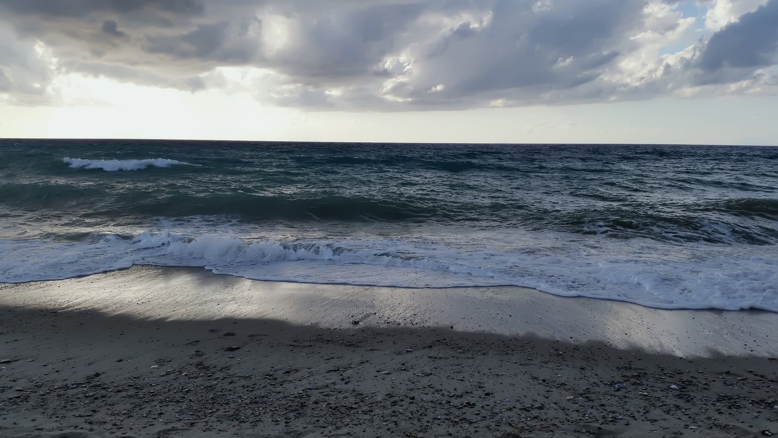 seashore under cloudy sky beach beauty in nature land cloud 2k 4k 5k