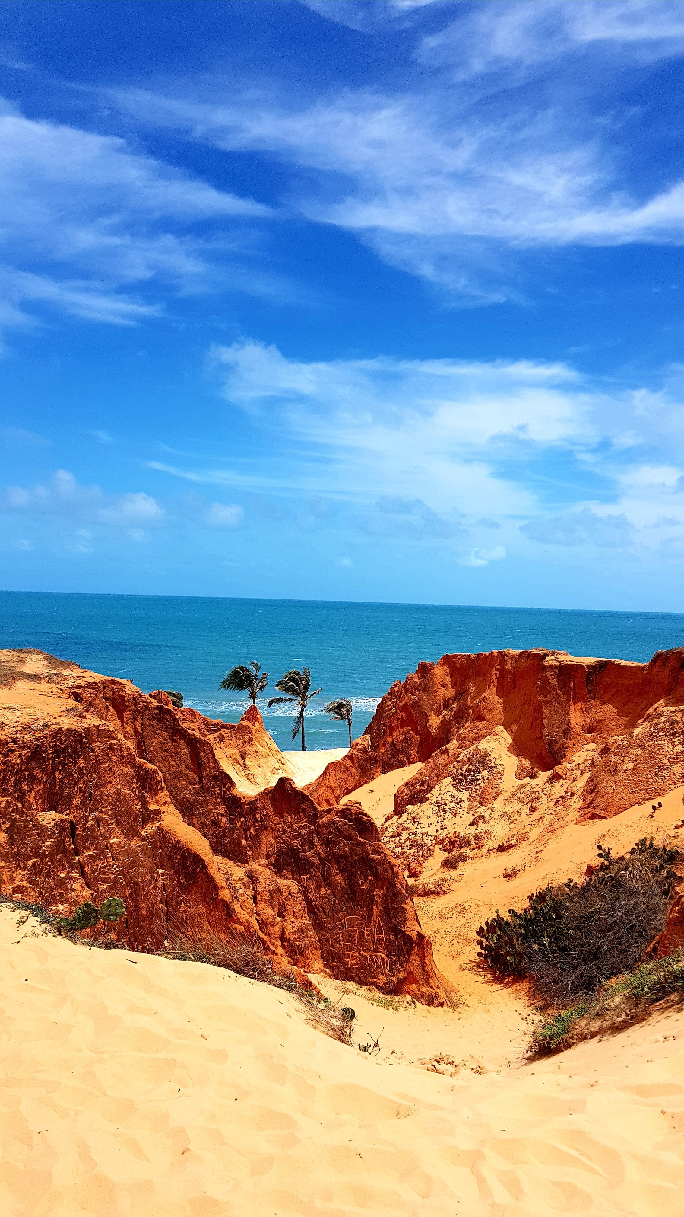 brown and white concrete house nature outdoors cliff mountain 2k