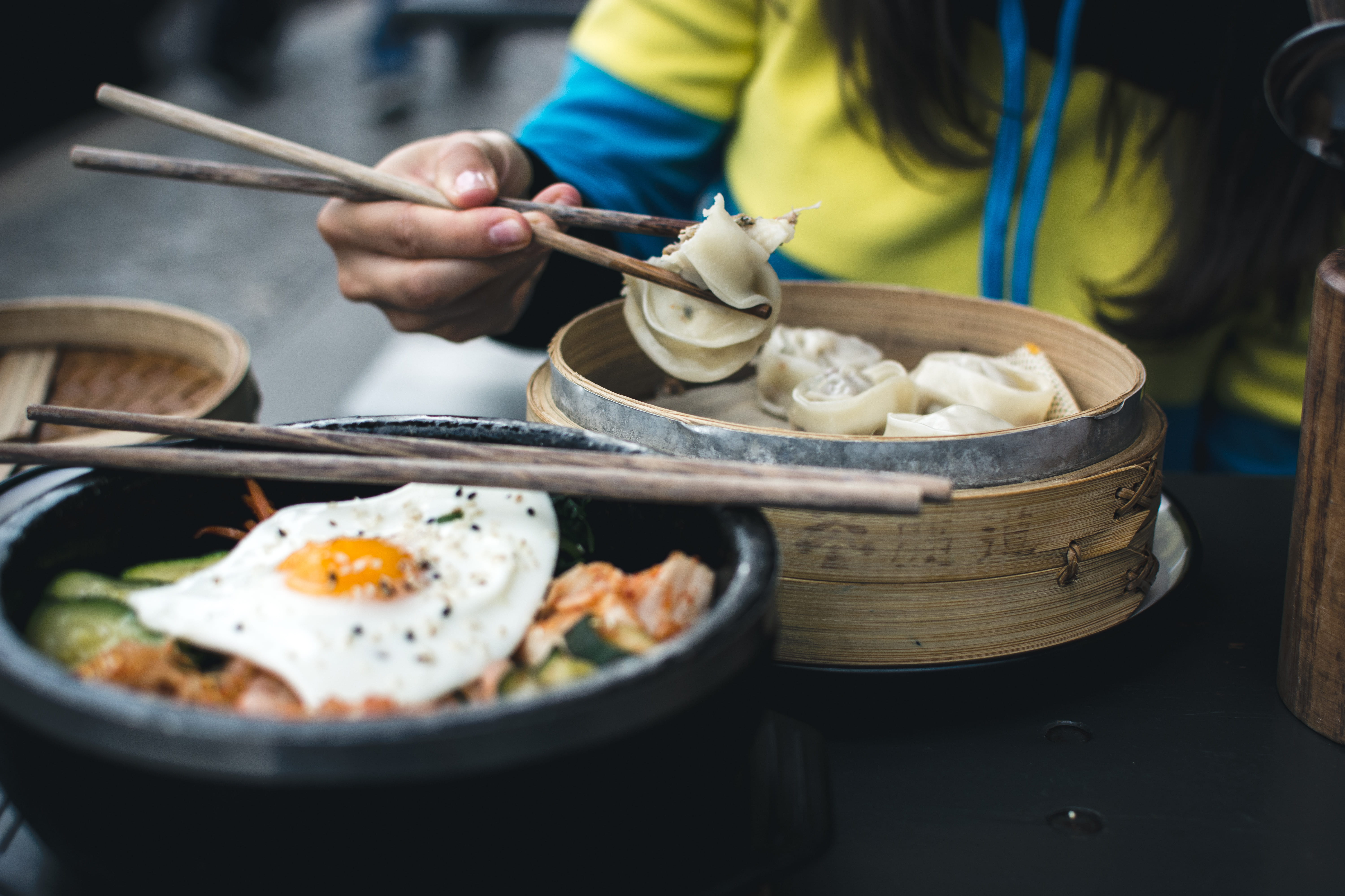Korean Bibimbap in YamYam Berlin chopsticks close up eating out 2k 4k 5k