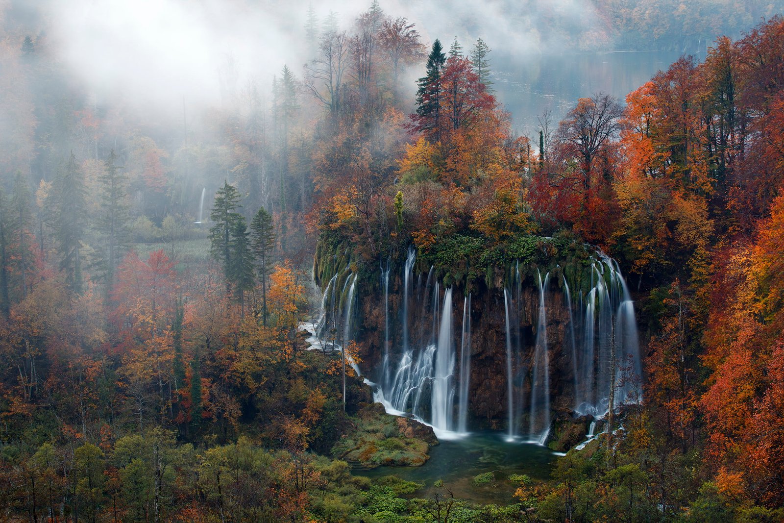 painting of falls and trees waterfalls near brown green 2k