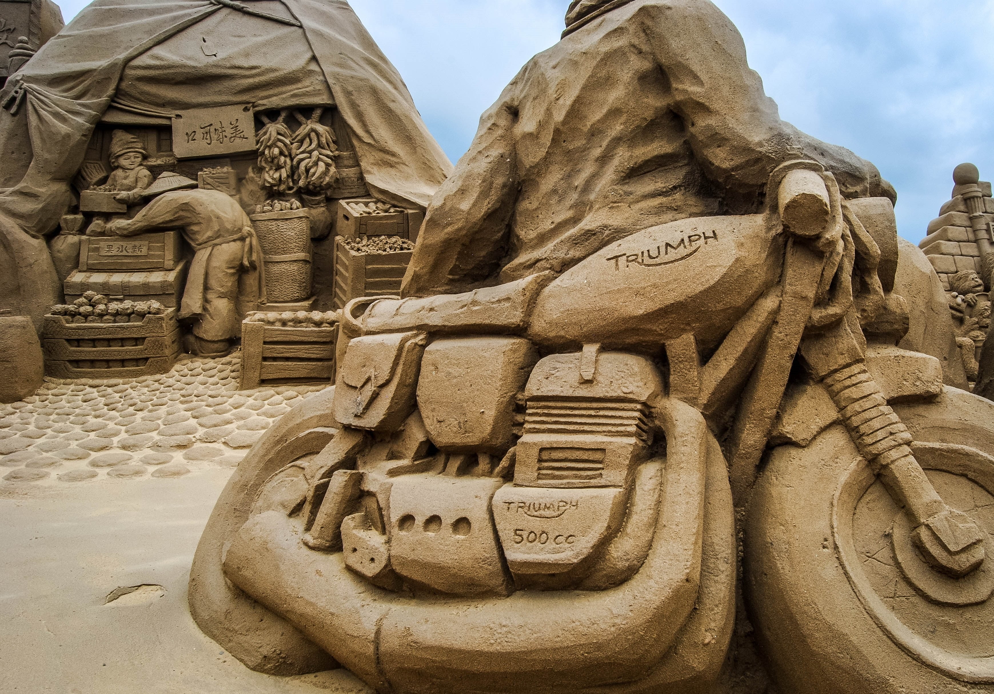 sculpture sand beach motorcycle Triumph art and craft 2k