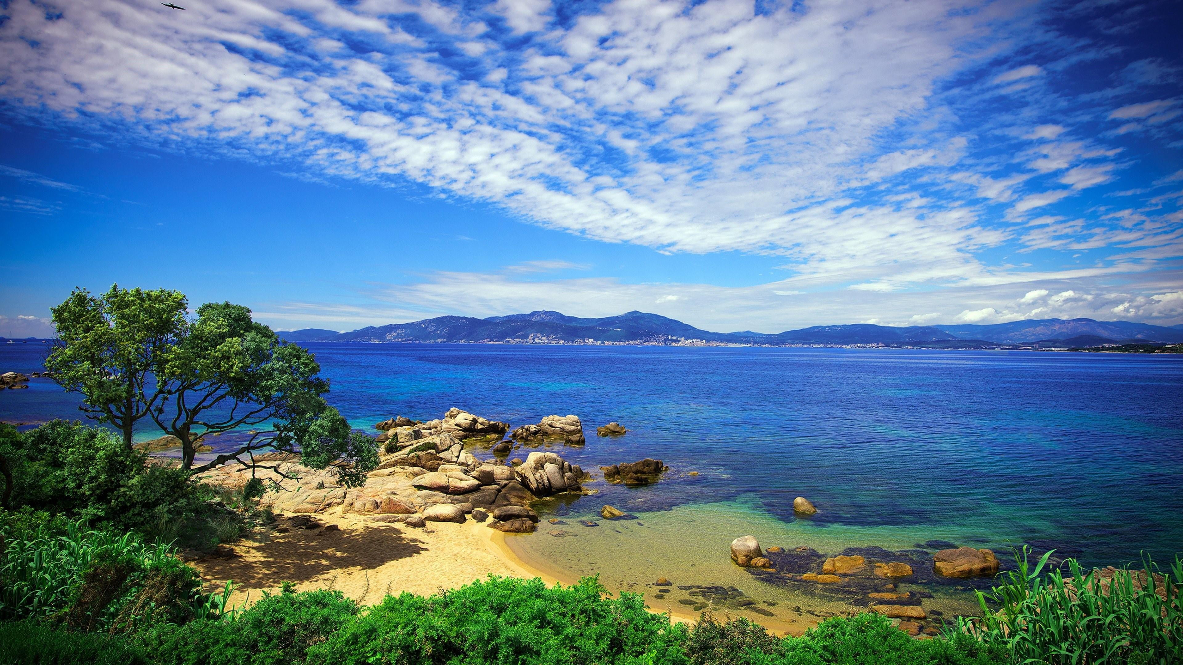 sky sea coast corsica water shore france europe tropics 2k 4k
