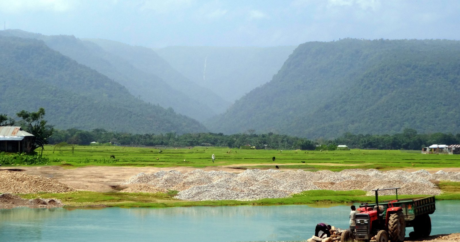 tractor on field near water during daytime bisnakandi sylhet 2k 4k 5k