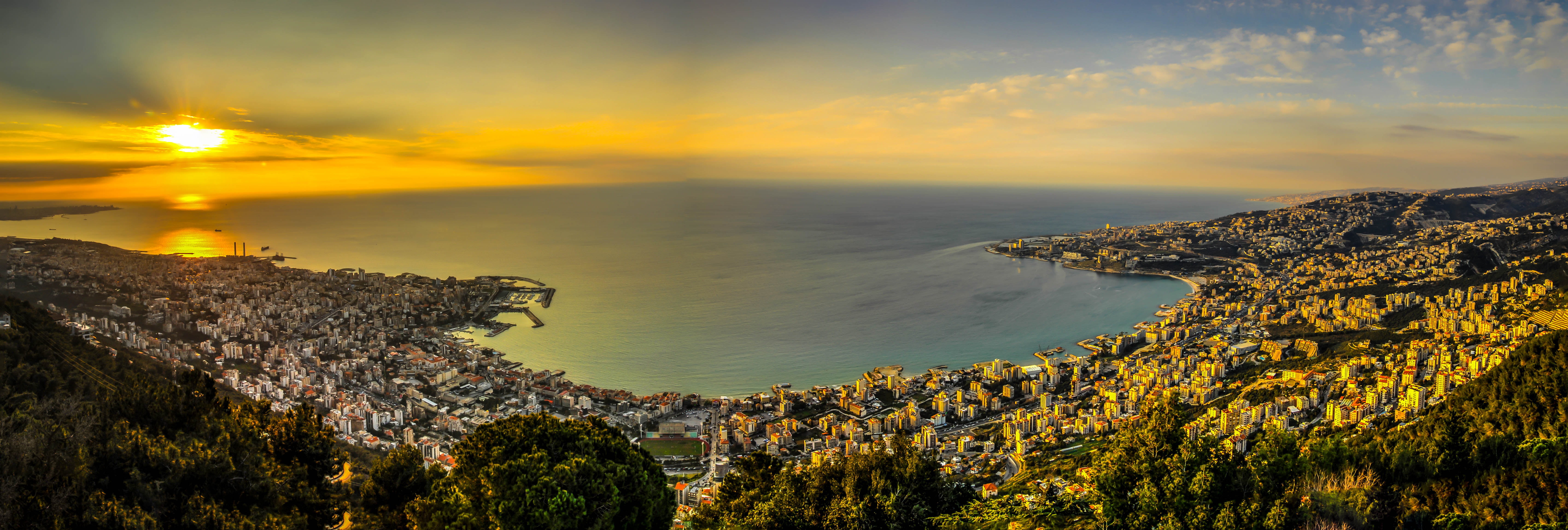 aerial view of city near seashore surrounded by mountains jounieh lebanon 2k 4k 5k