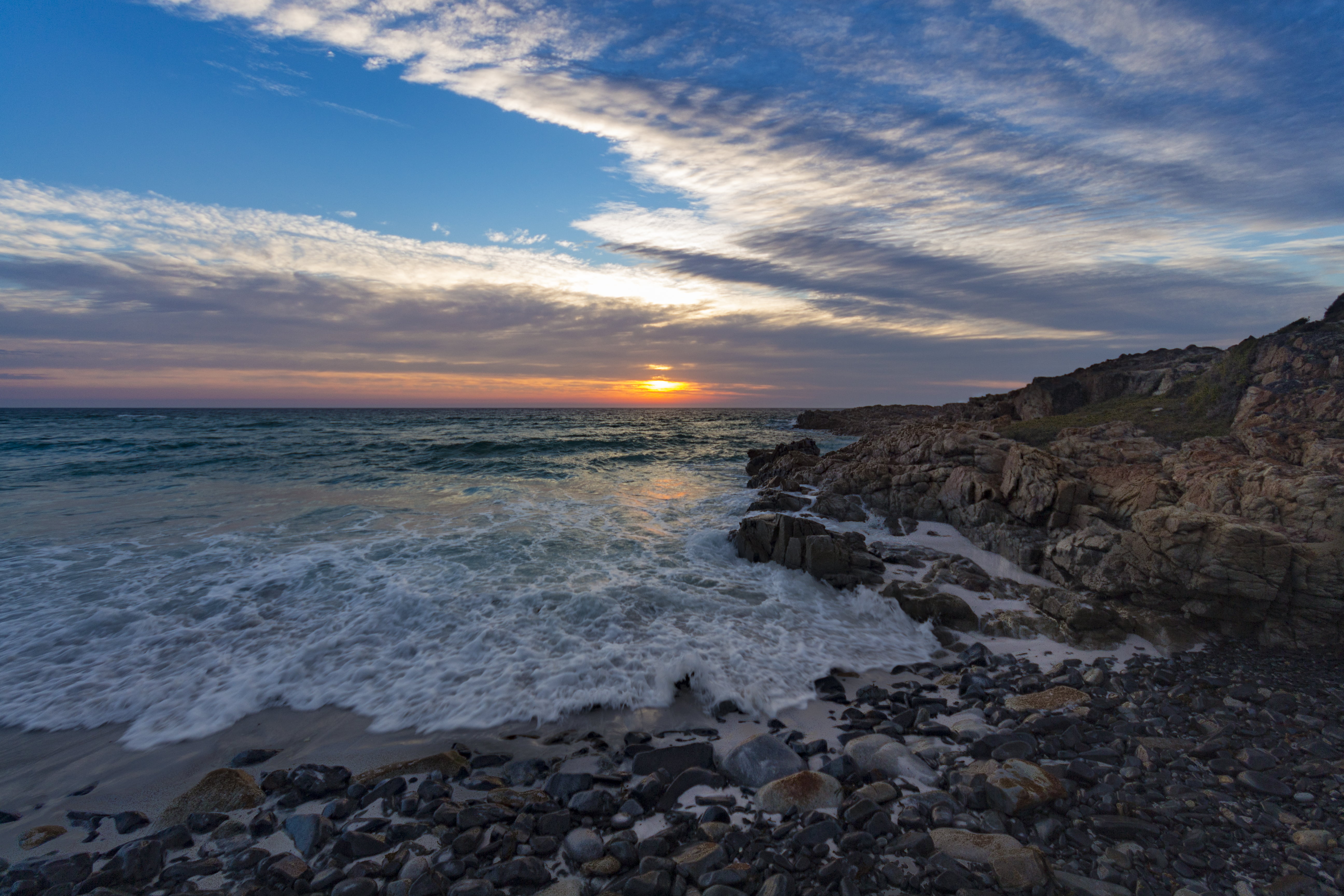 aerial view of sea near rocky seashore under clouds tasmania 2k 4k 5k