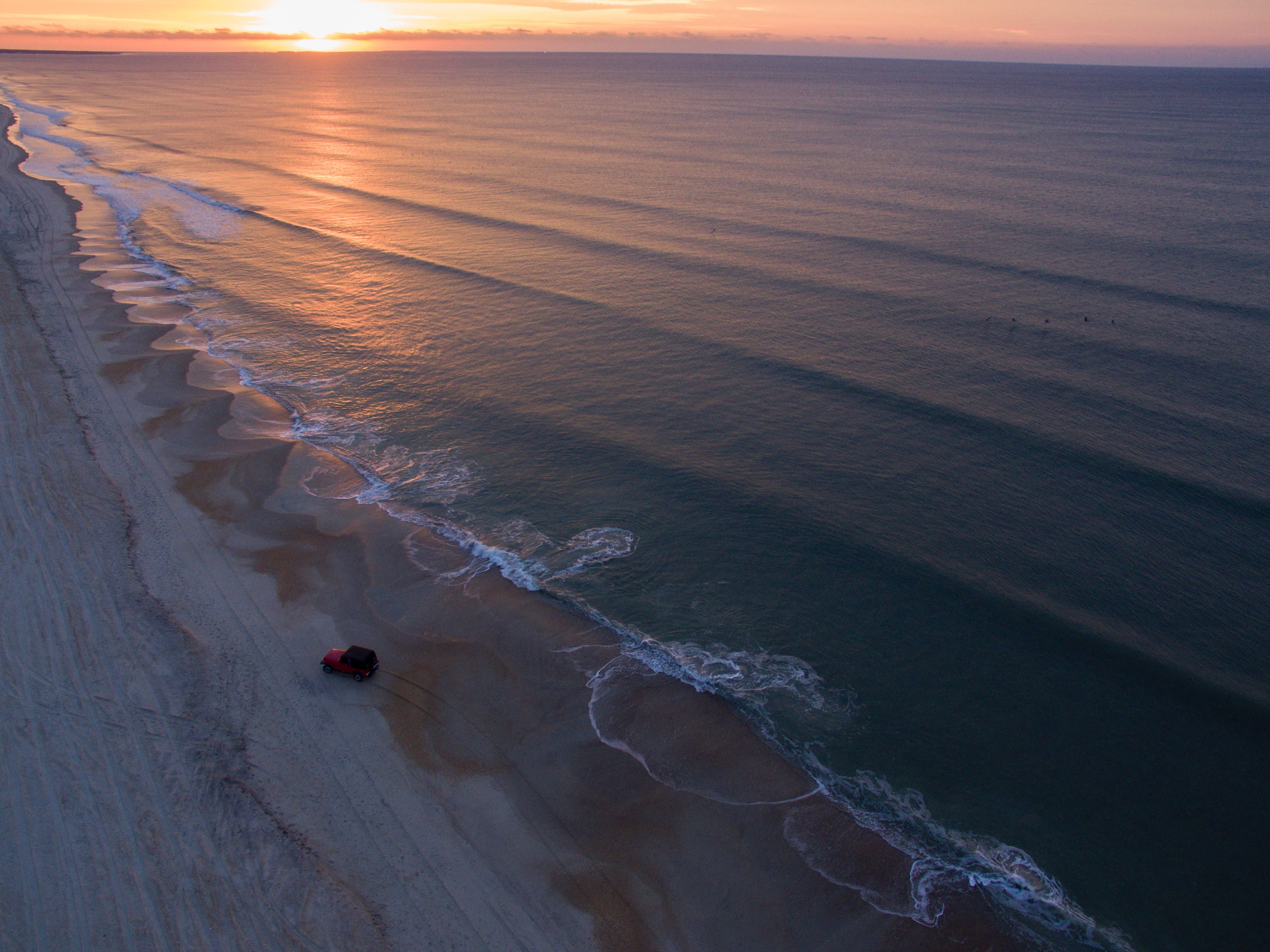 body of water nature landscape sky clouds sea sunset rocks 2k 4k