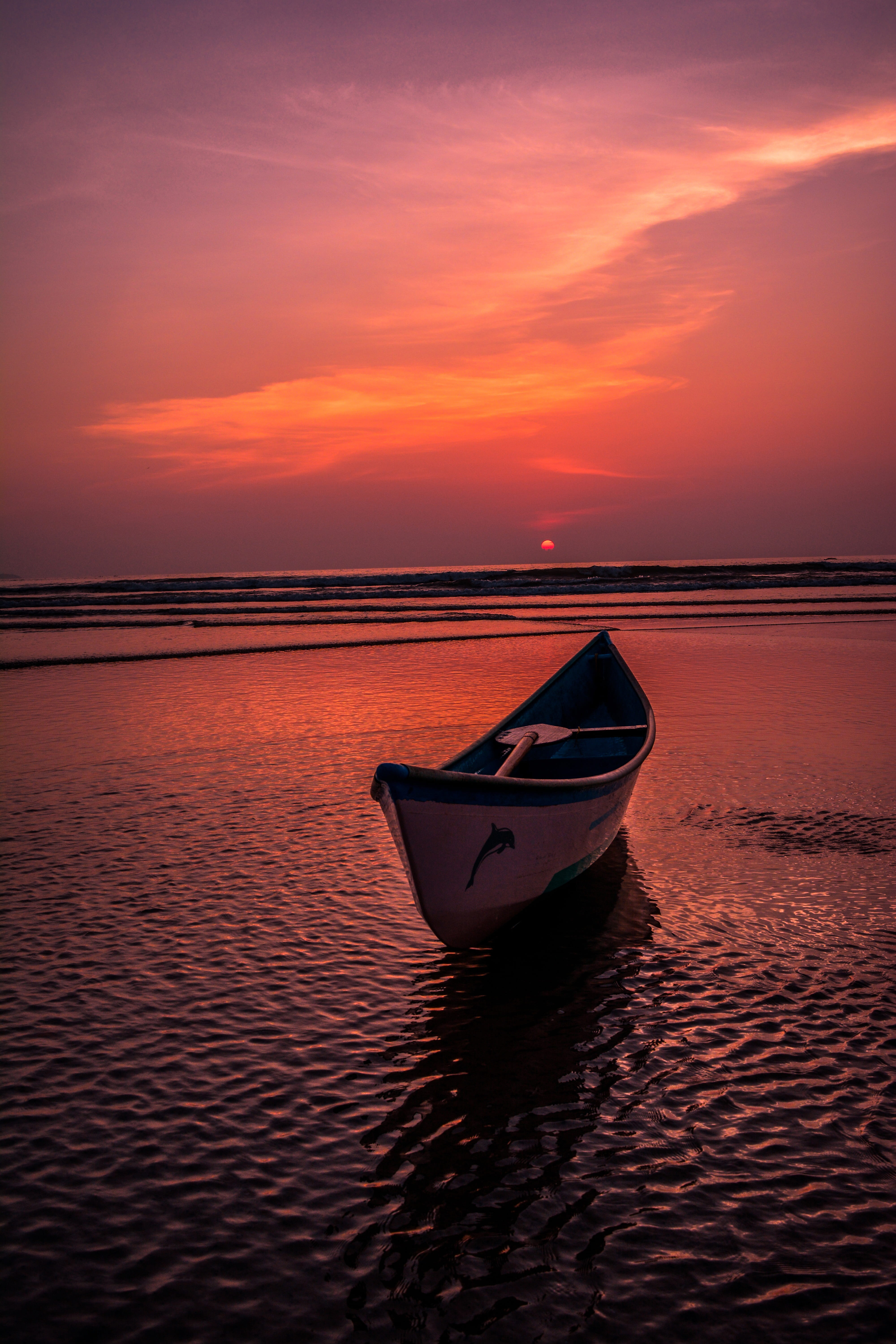 empty boat during golden hourse ocean sunset beach nature 2k 4k