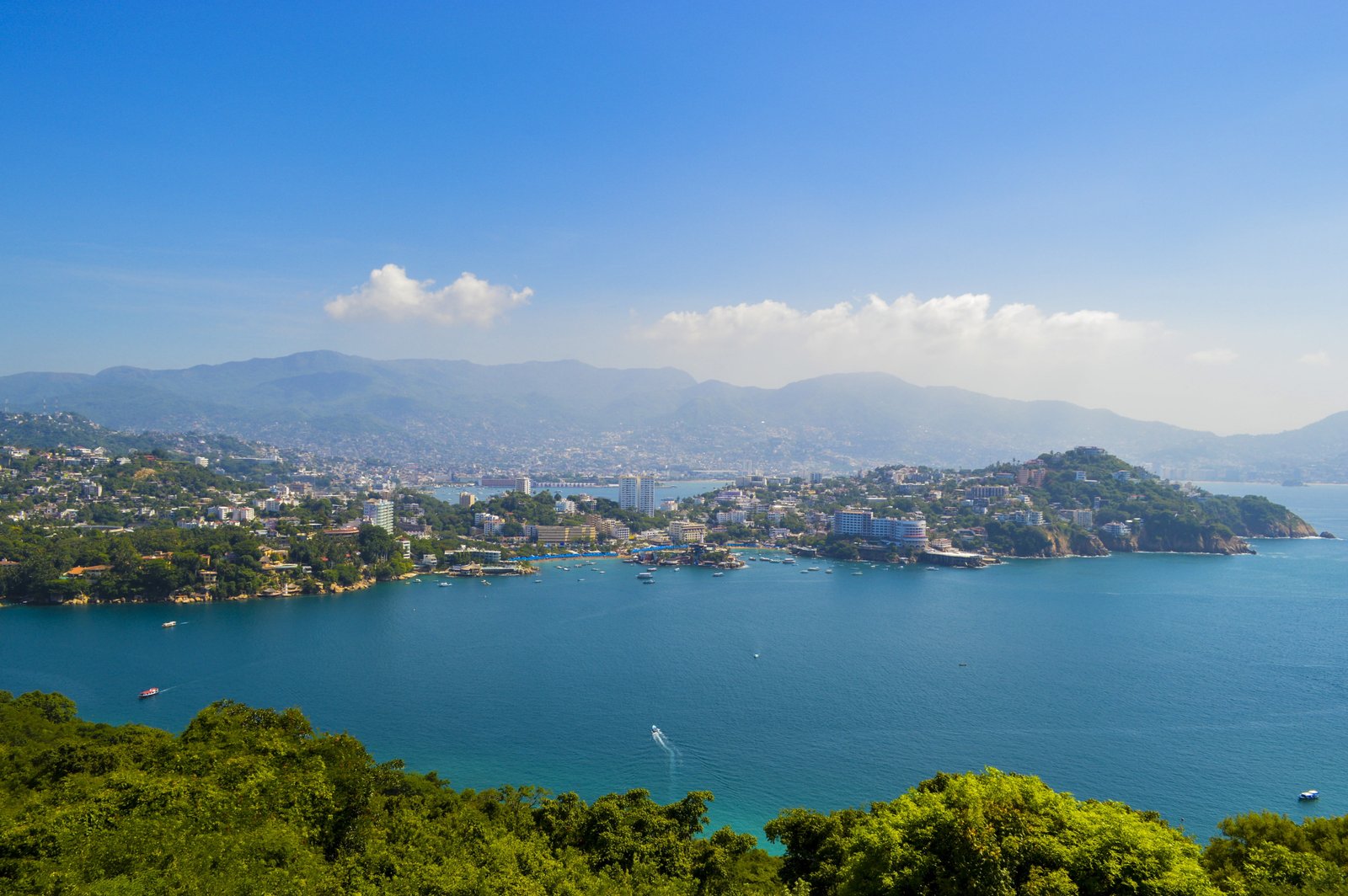 birds eye view of city building beside body water acapulco 2k 4k 5k