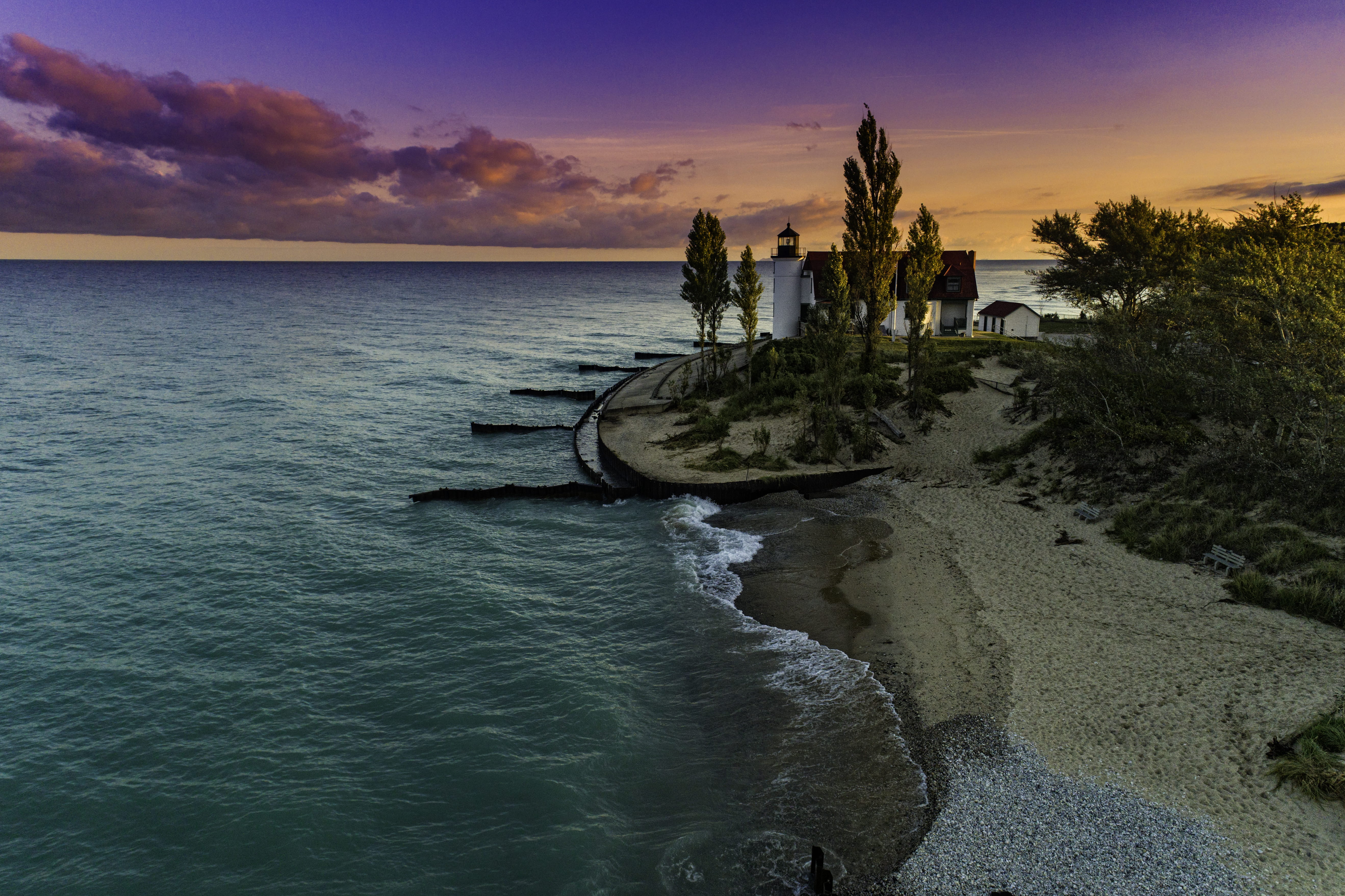 body of water near tree lake michigan lighthouse point betsie 2k 4k 5k