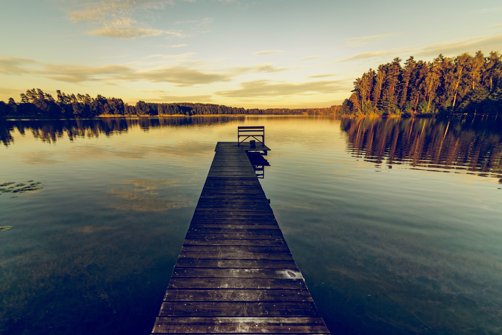 brown wooden dock on lake during daytime sky reflection water 2k 4k 5k