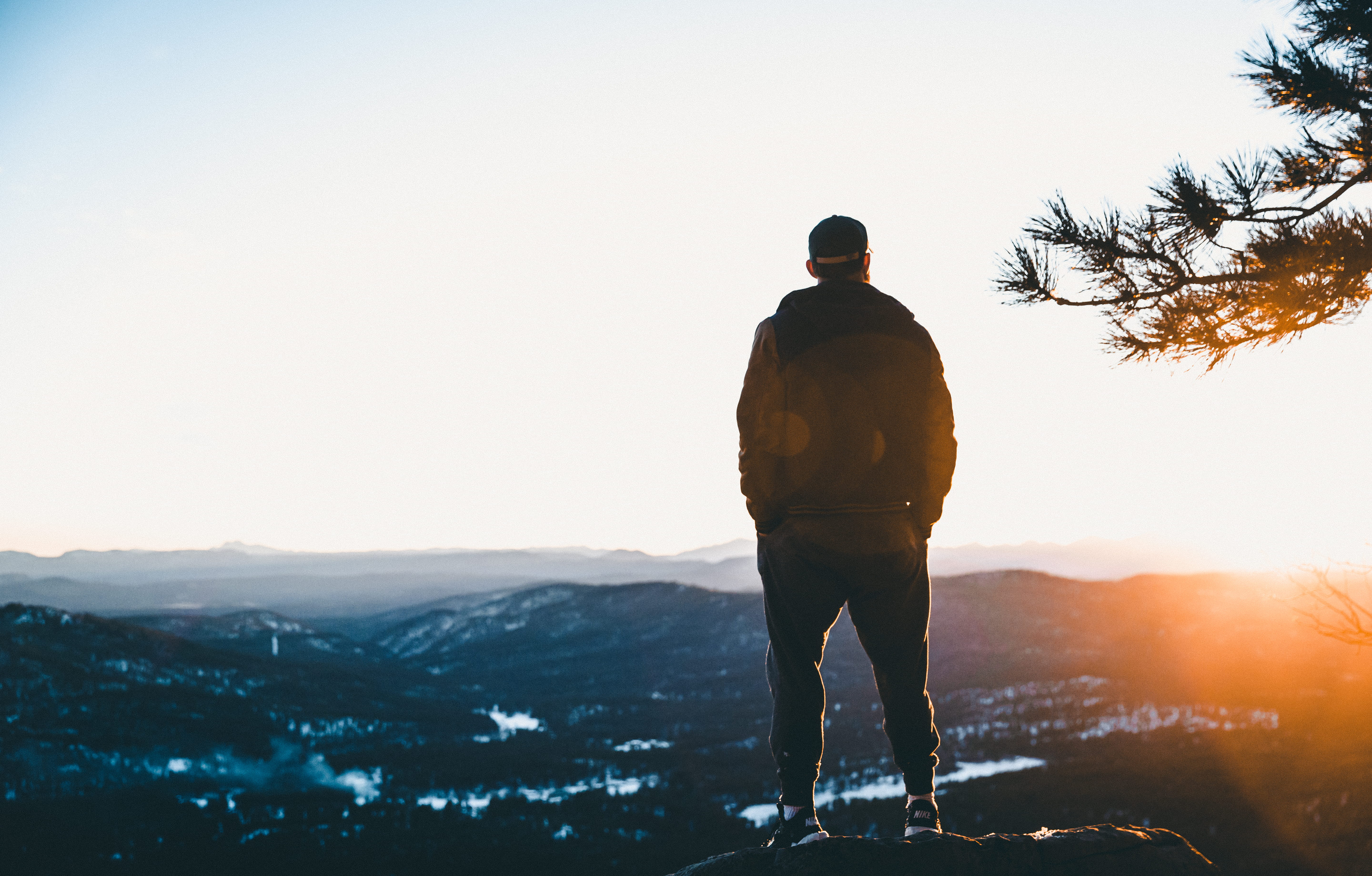 man standing on cliff mountains overview untitled in black 2k 4k 5k