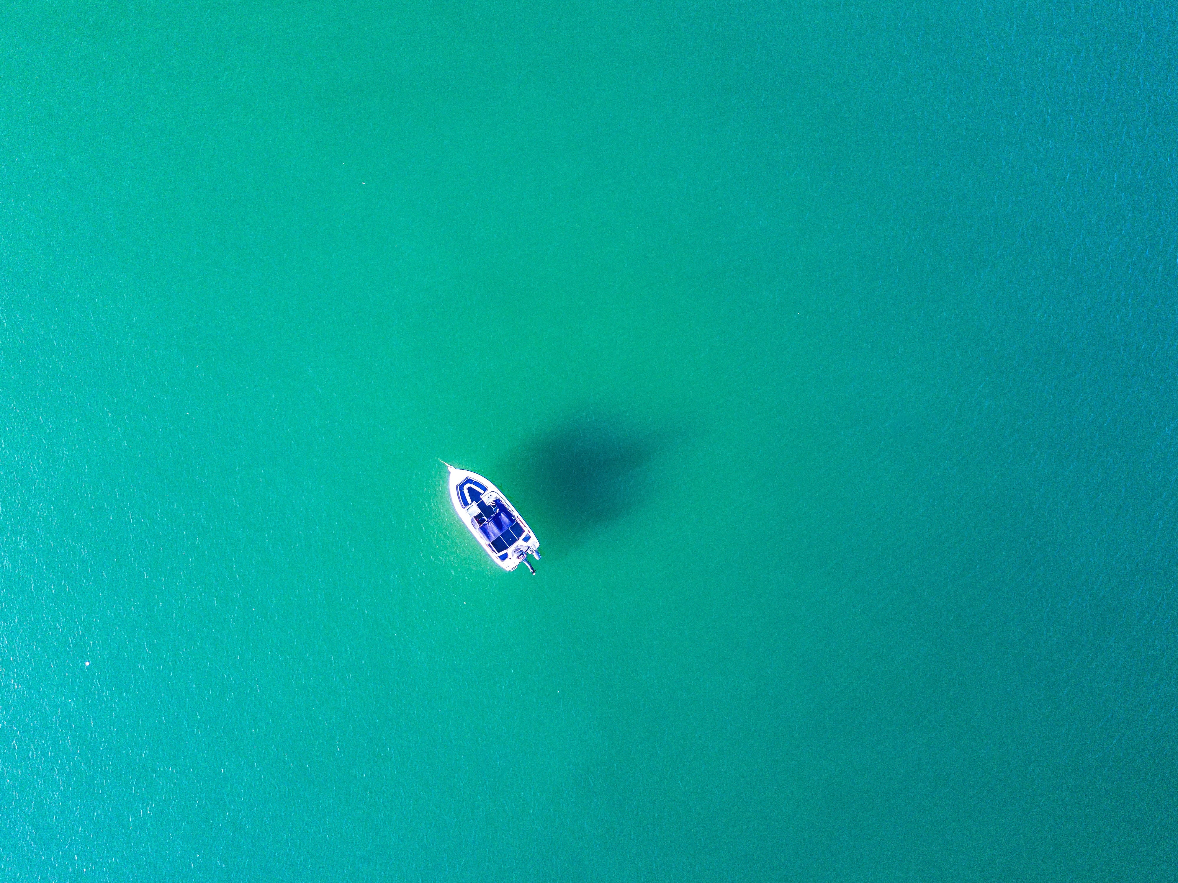 white and blue boat sea water nature turquoise aerial view 2k 4k