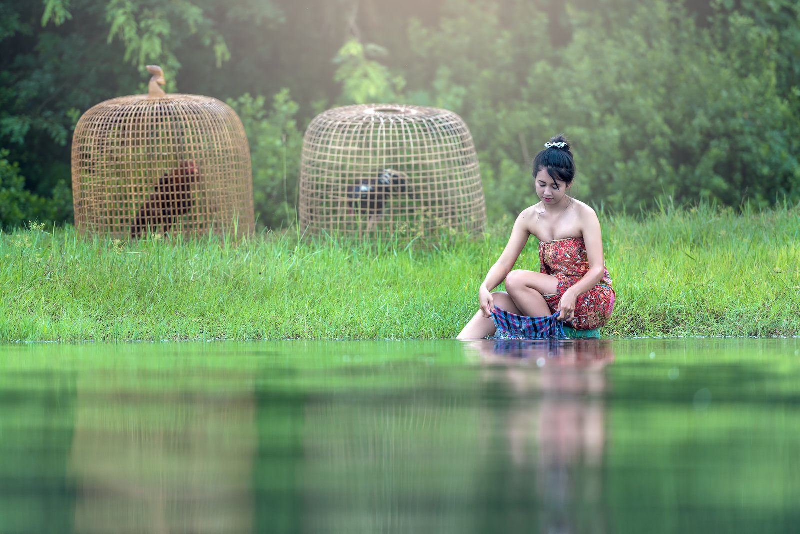woman washing clothes on lake cleaning clothing river young 2k 4k 5k