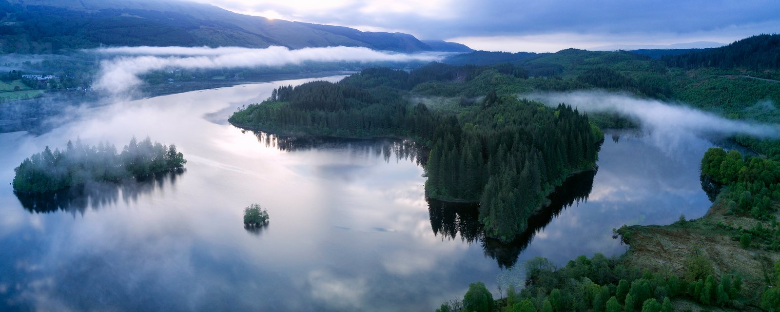 aerial photo of green trees beside body water at daytime Morning 2k 4k 5k 8k