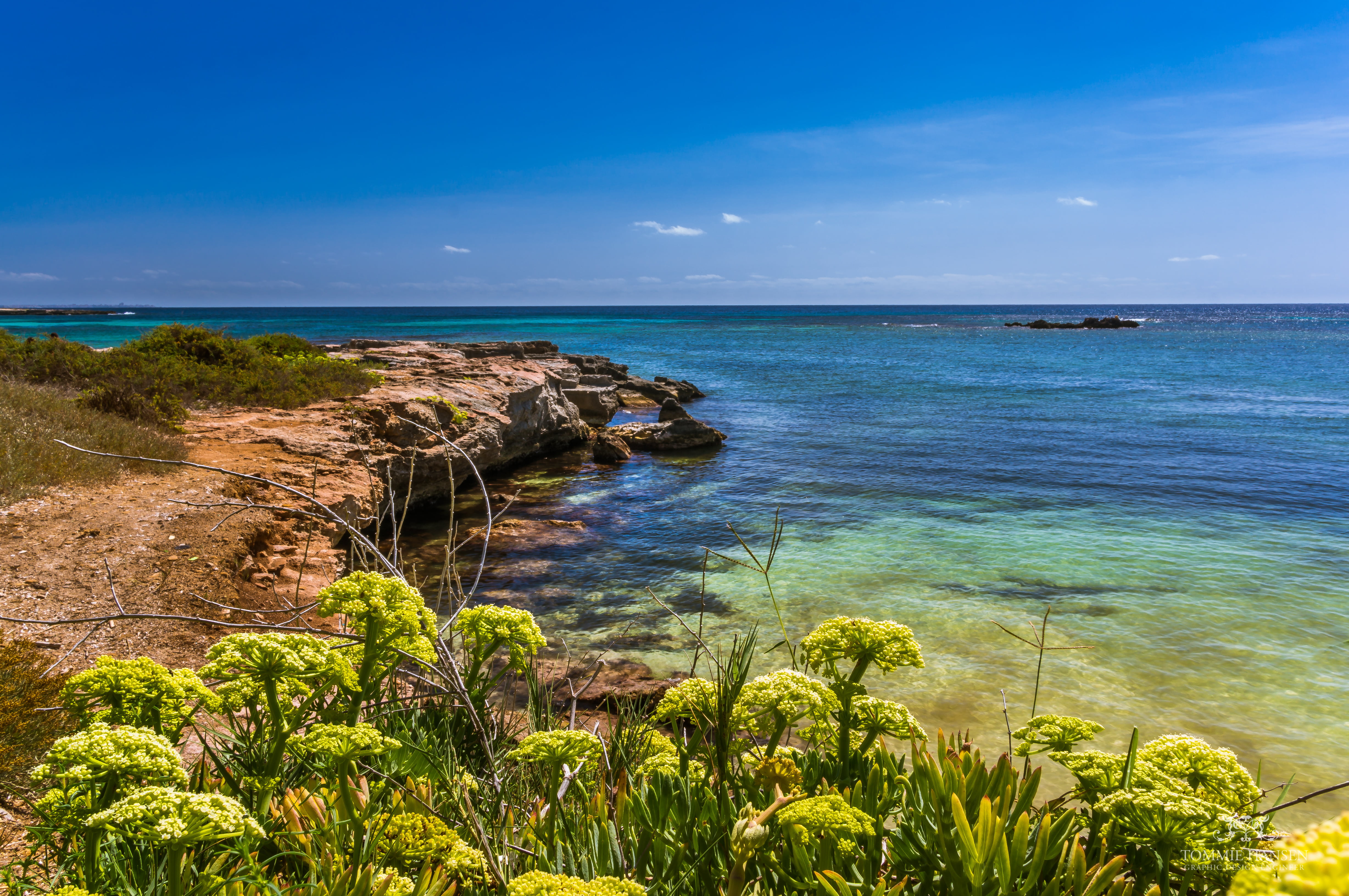 blue body of water near sea shore during daytime favignana sicily italy 2k 4k 5k