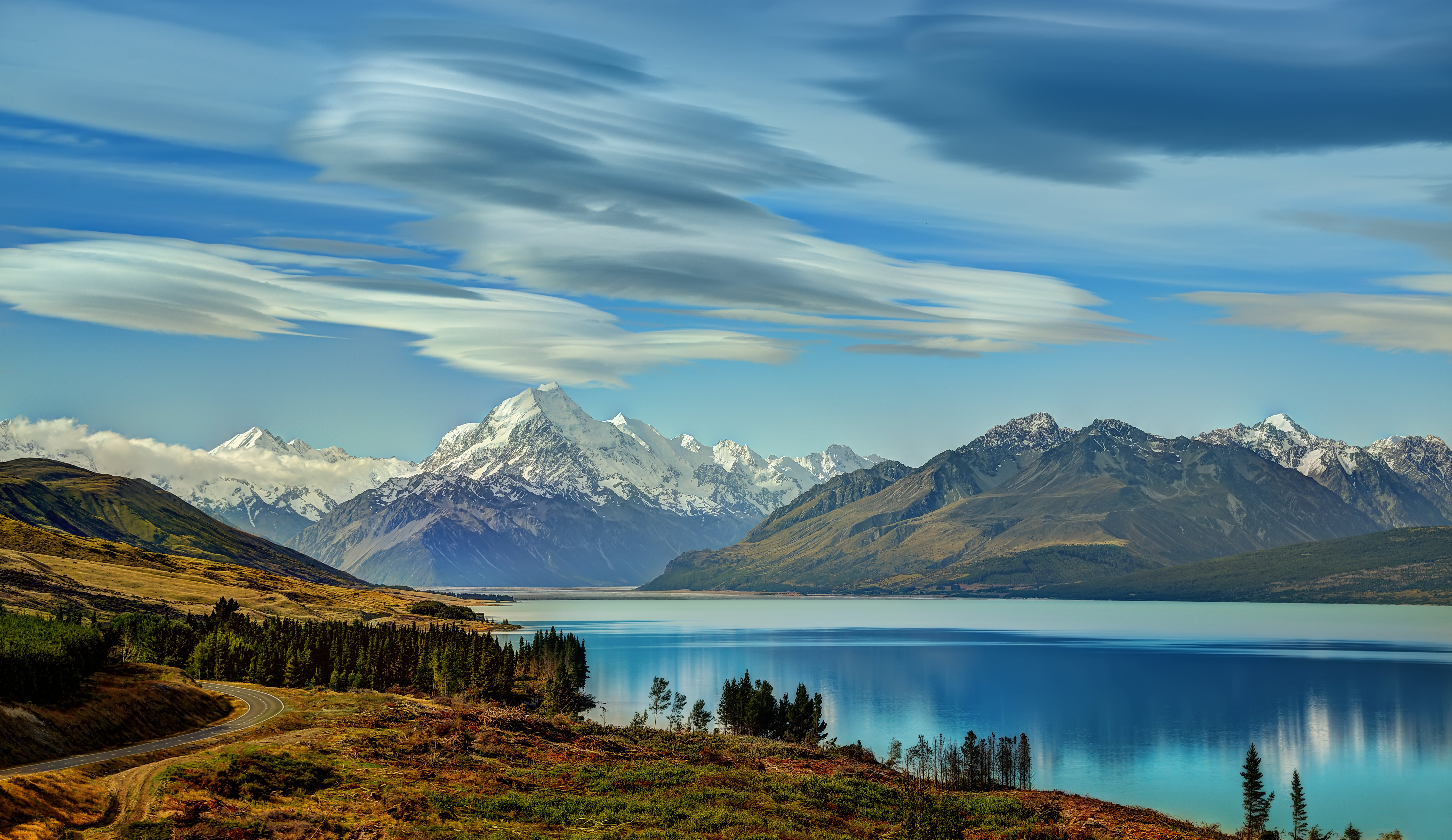 green mountain on body of water mount cook lake pukaki 2k 4k 5k