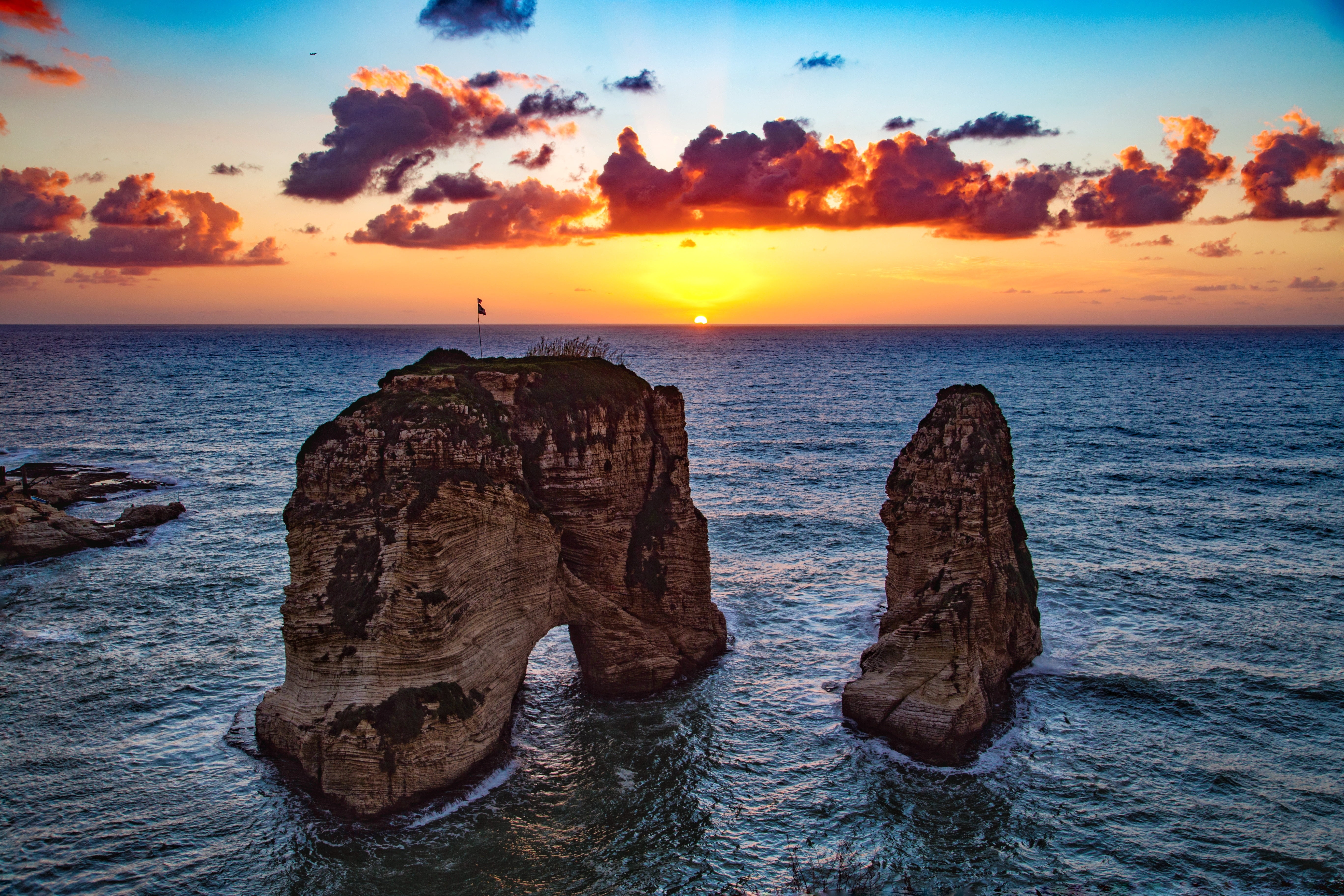 three brown rock formations raouche rocks beirut lebanon sea 2k 4k 5k