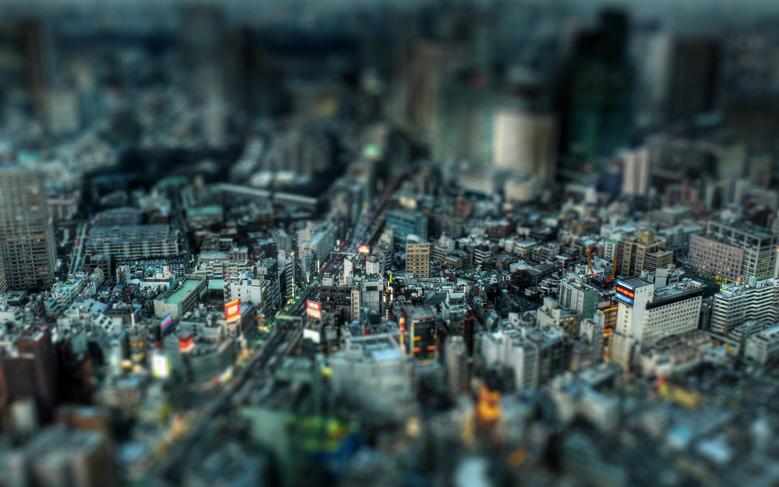 aerial photography of concrete buildings shallow focus photo city skyline 2k
