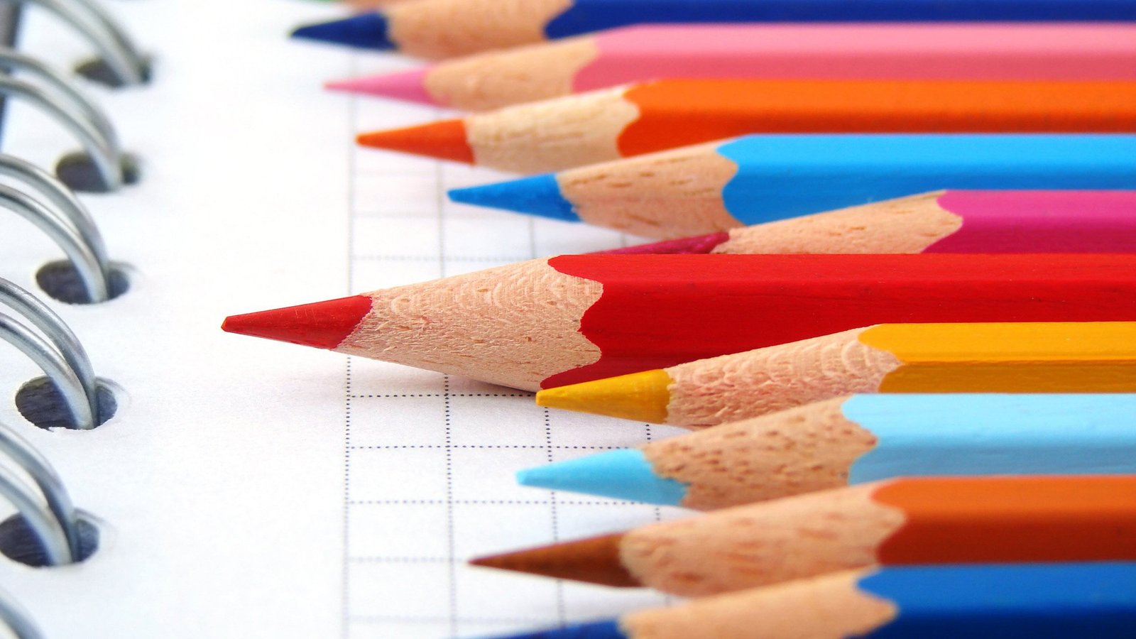assorted color pencil lot selective focus photo of coloring pencils placed on top book 2k