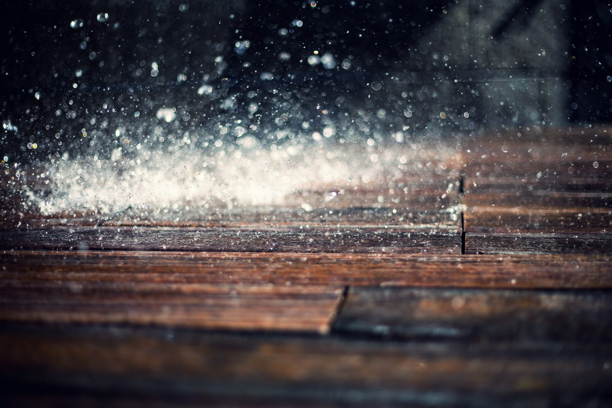 brown parquet flooring timelapse photography of rain drops hits on floor 2k
