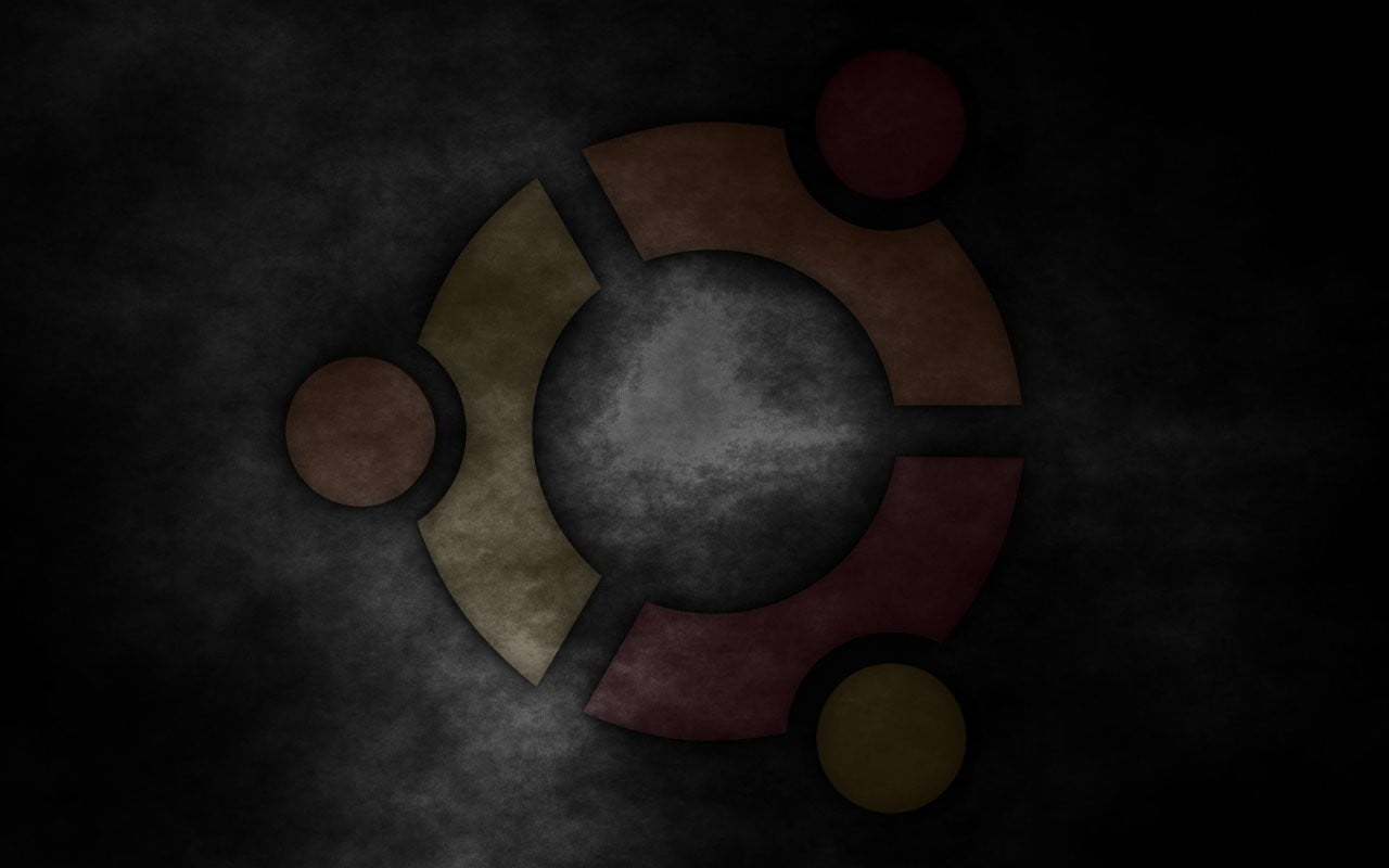 round multicolored illustration Ubuntu Linux logo indoors